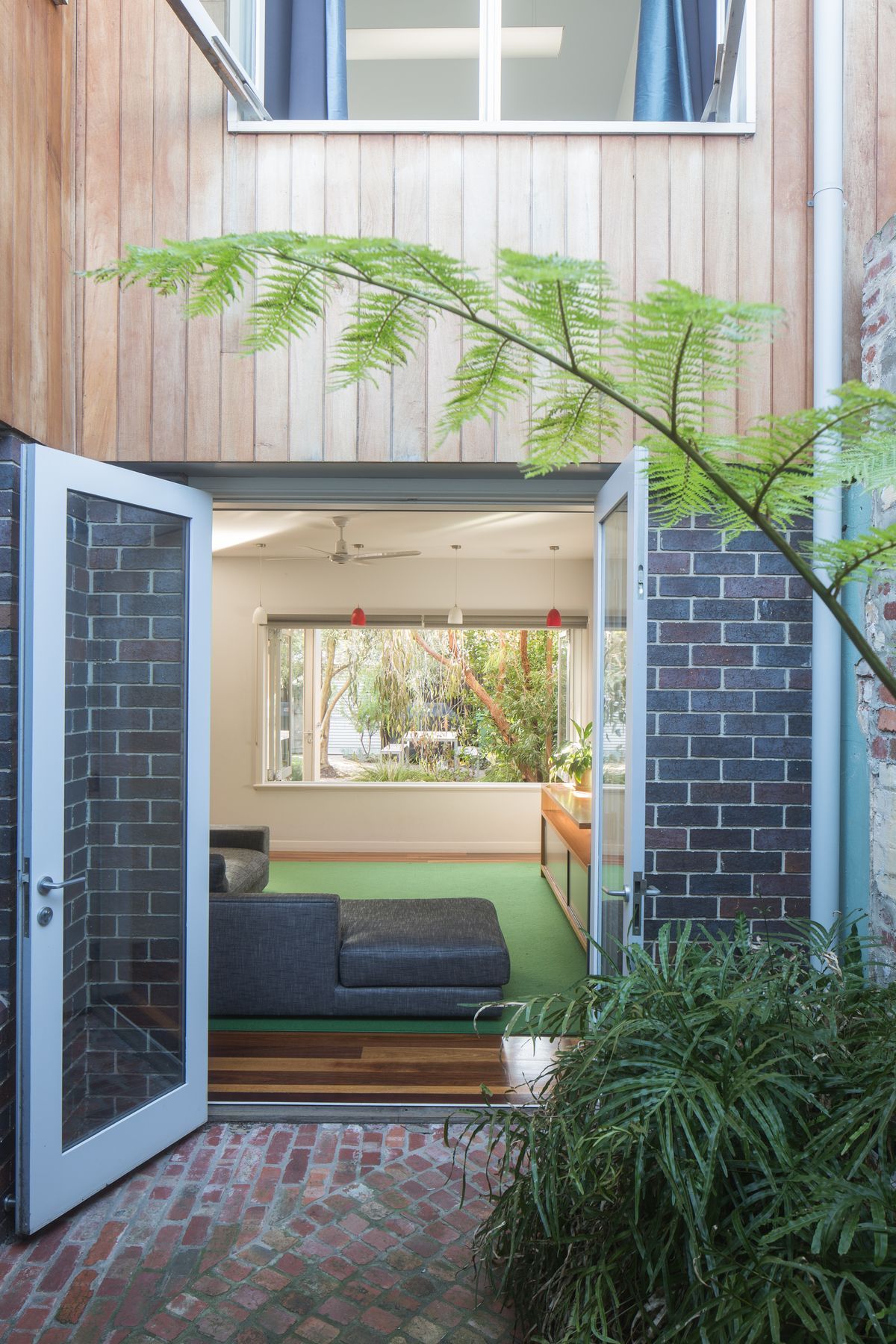 Second storey timber cladding and large window