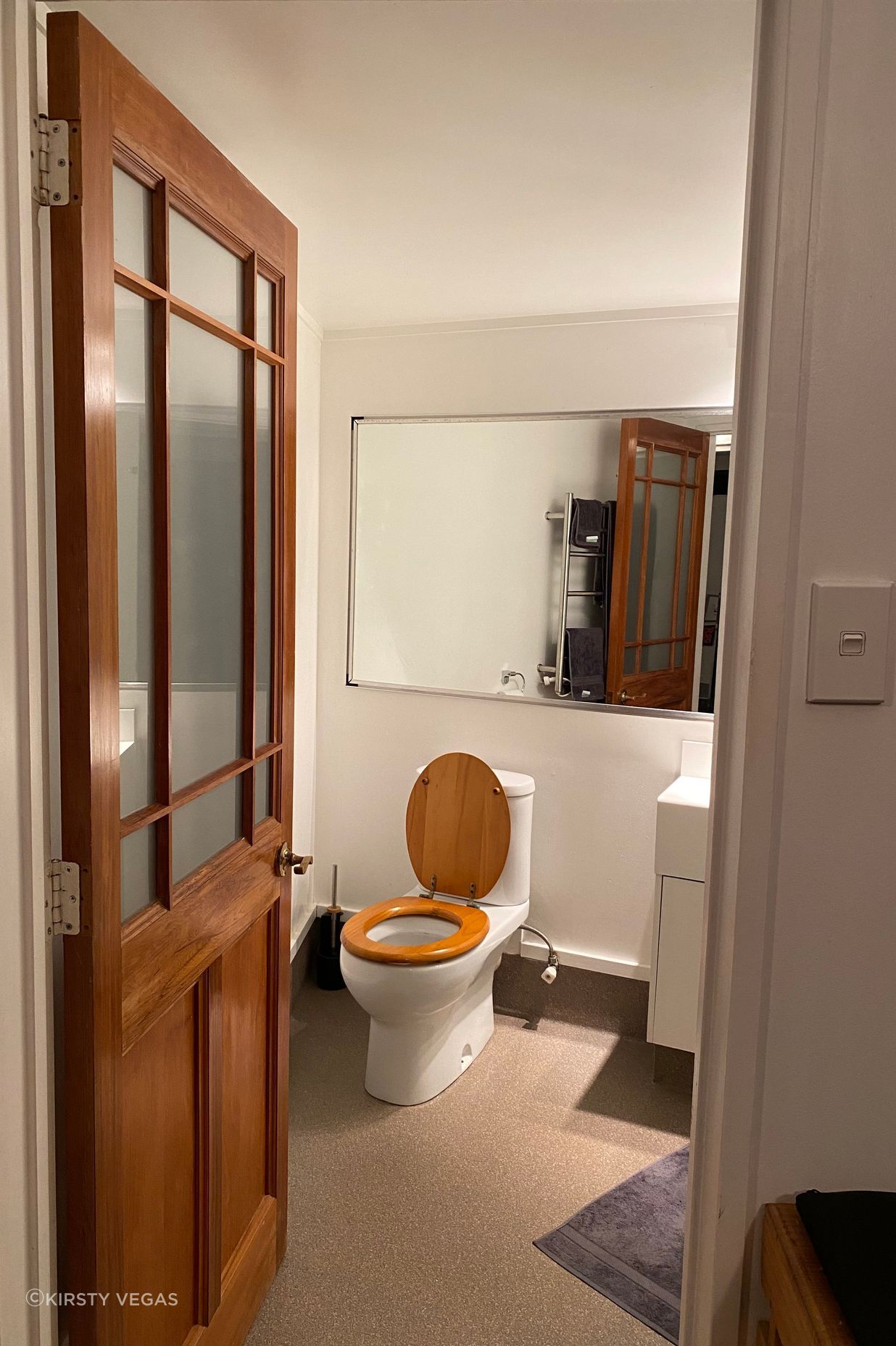 The outdated bathroom, now transformed into a sleek and contemporary modern space.