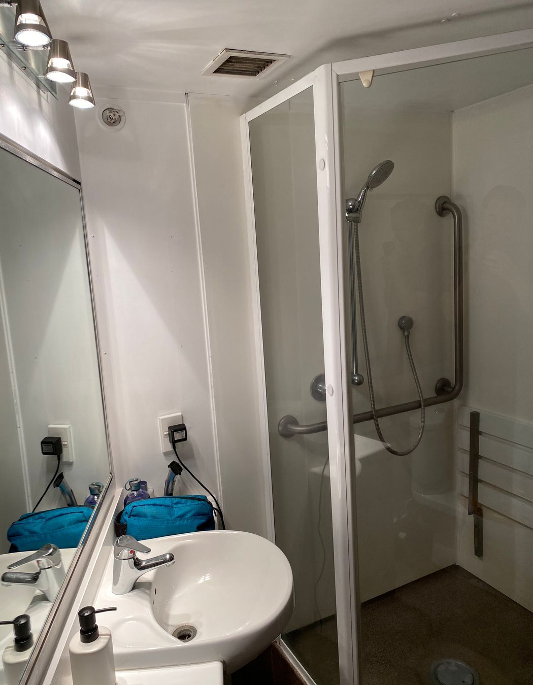 Goodbye to the cramped, unattractive 1.8 metre high shower cubicle—this space is now transformed, maximizing both space and style!
