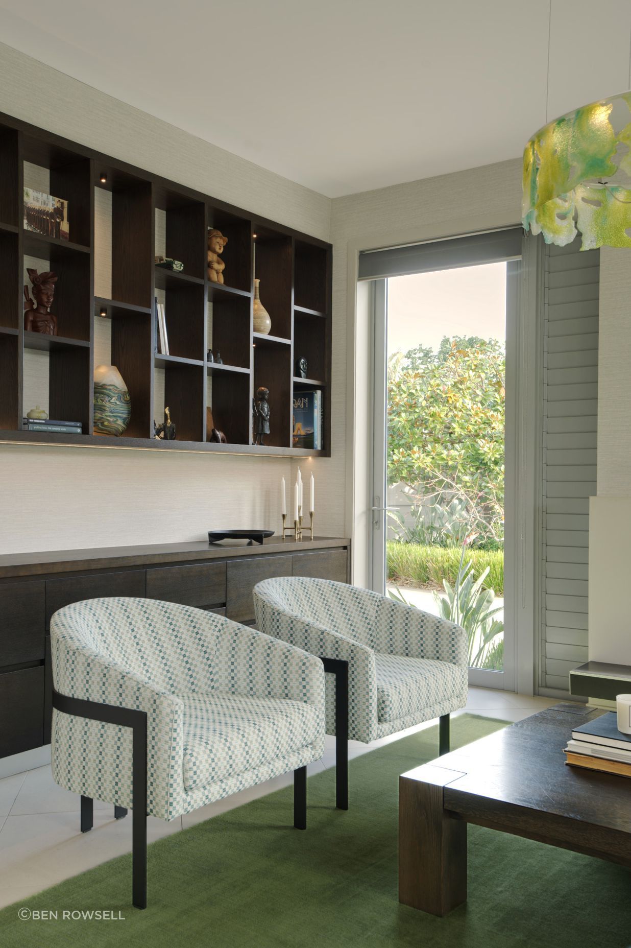 Lounge interior renovation with bespoke oak cabinetry.