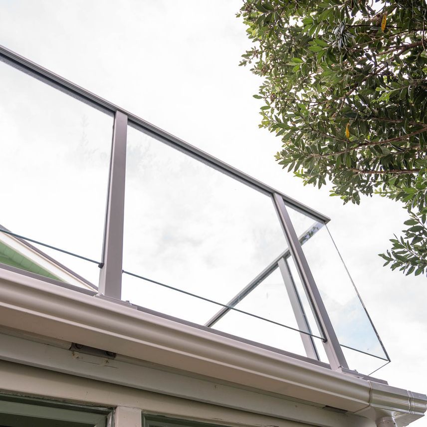 Bottom Flat Renovation + Glass Balustrade Island Bay, Wellington by