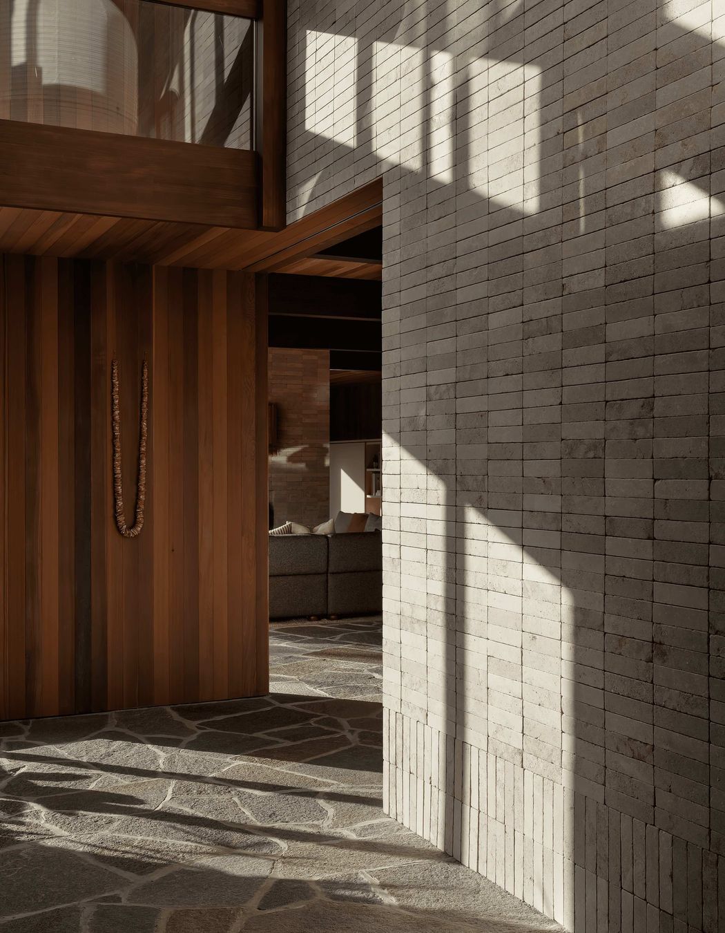 To embed the home resolutely in its locale through materiality, incorporating textural surfaces was pivotal. “Instantly struck by the rich texture of the stone and variation of tone that was at play from piece to piece,” Alex was taken by the soft yet robust nature of Luca crazy paving