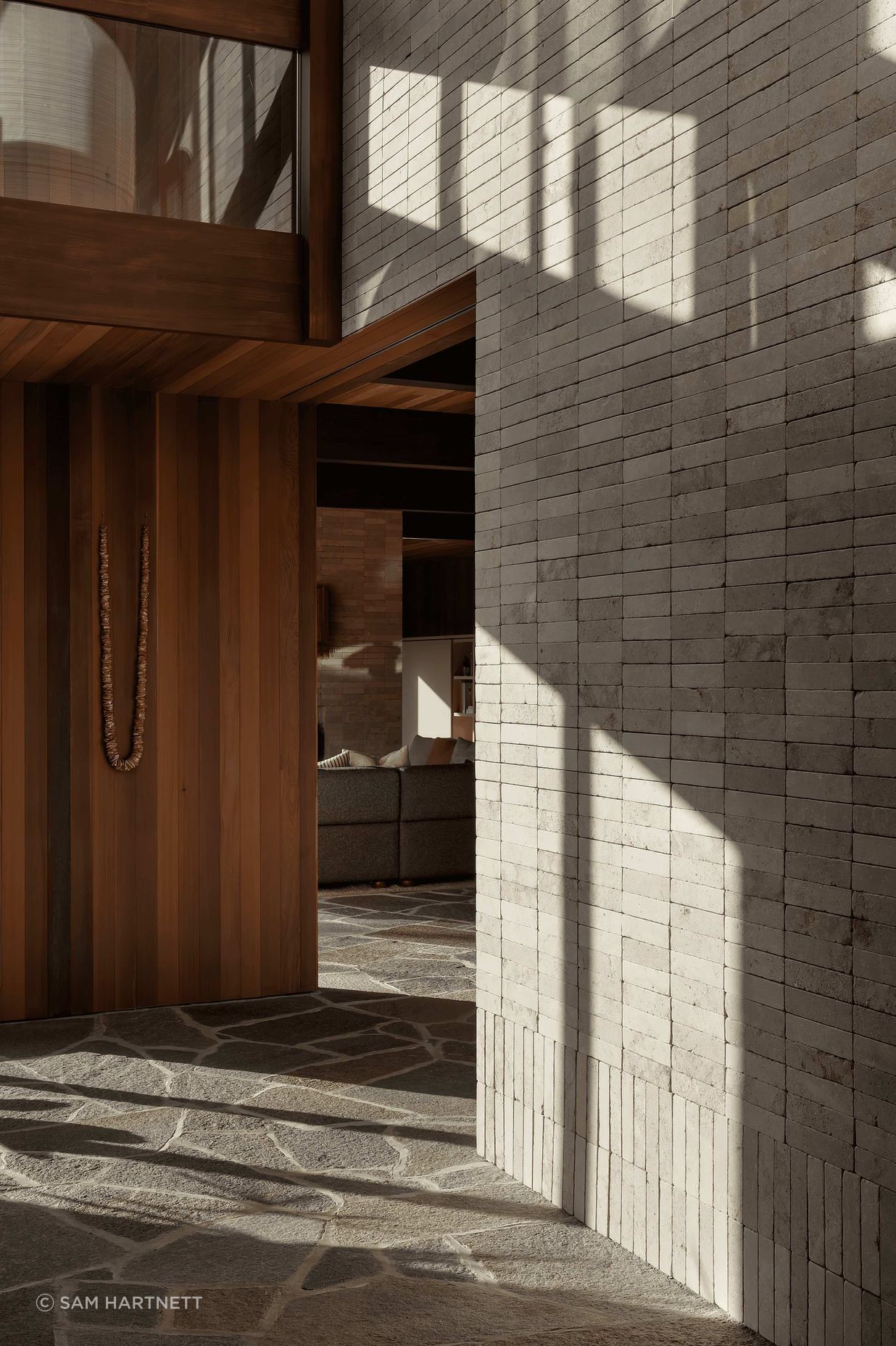 To embed the home resolutely in its locale through materiality, incorporating textural surfaces was pivotal. “Instantly struck by the rich texture of the stone and variation of tone that was at play from piece to piece,” Alex was taken by the soft yet robust nature of Luca crazy paving