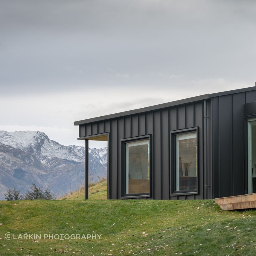 The master bedroom has expansive views towards Coronet Peak