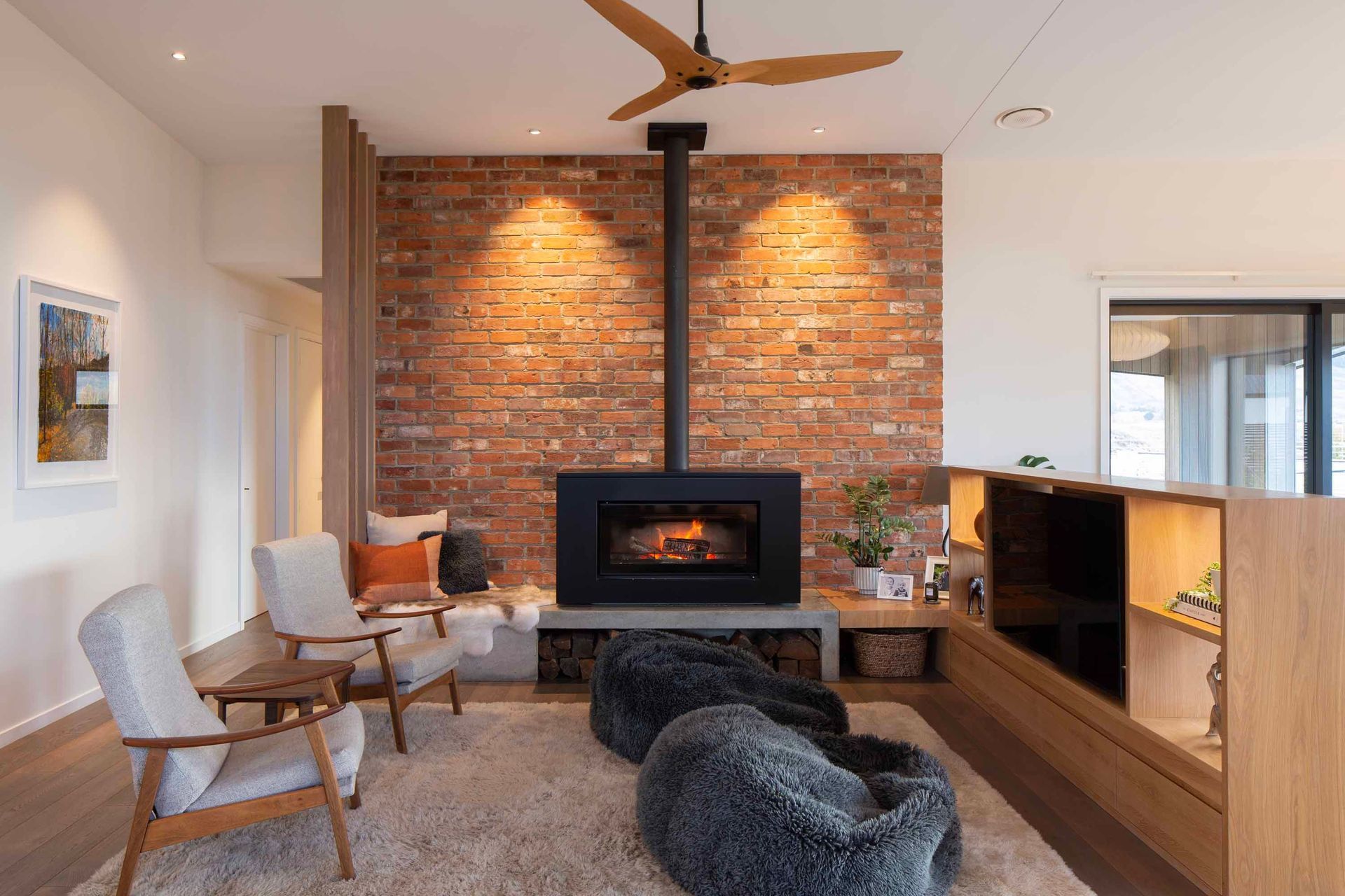 Split-level-living-area-with-wood-burner-fireplace.jpg