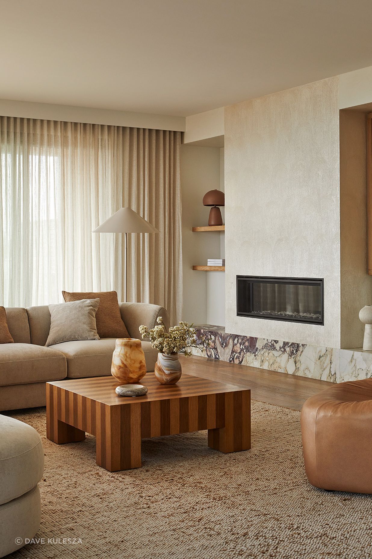 Pictured: Natadora Arbor Sofa Chair, Reese Square Coffee Table, Hanson Spire Vessel, Rufus Indra Shallow Bowl, Boden Perry Vase, Easton Shelter Floor Lamp, Easton Arch Table Lamp, Madrid Modular Sofa