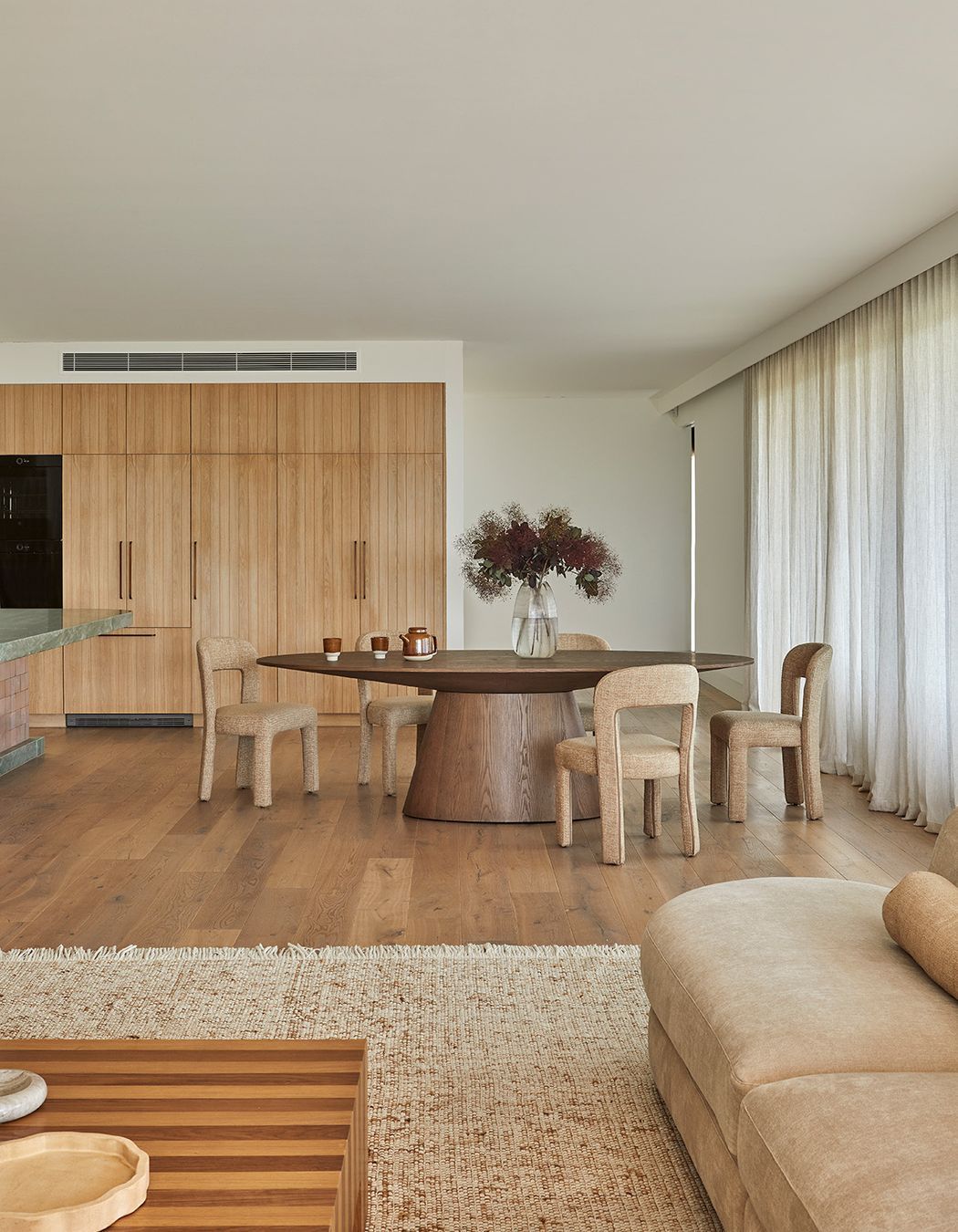 Pictured: Eleanor Dining Chair, Classique Oval Dining Table, Boden Ridge Vase, Reese Square Coffee Table, Rufus Ares Bowl, Rufus Indra Shallow Bowl