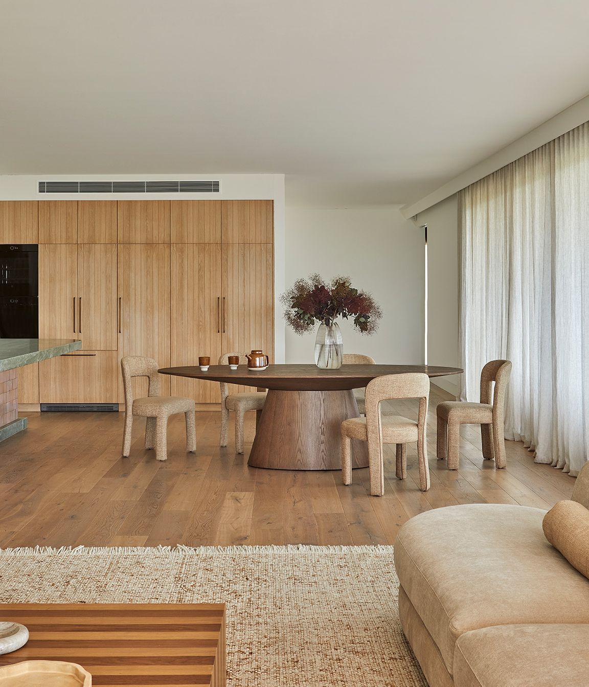 Pictured: Eleanor Dining Chair, Classique Oval Dining Table, Boden Ridge Vase, Reese Square Coffee Table, Rufus Ares Bowl, Rufus Indra Shallow Bowl