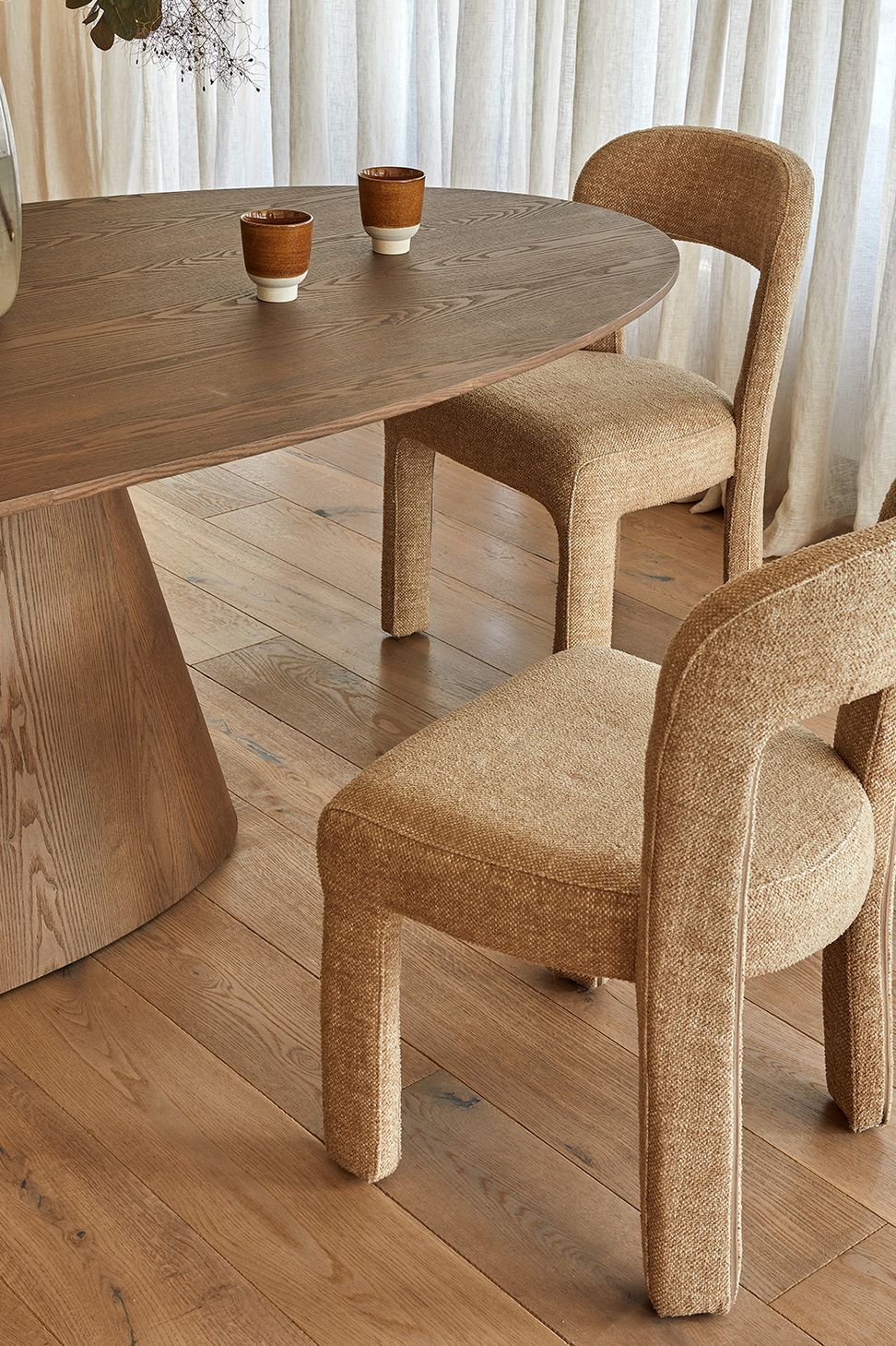 Pictured: Eleanor Dining Chair, Classique Oval Dining Table, Boden Ridge Vase