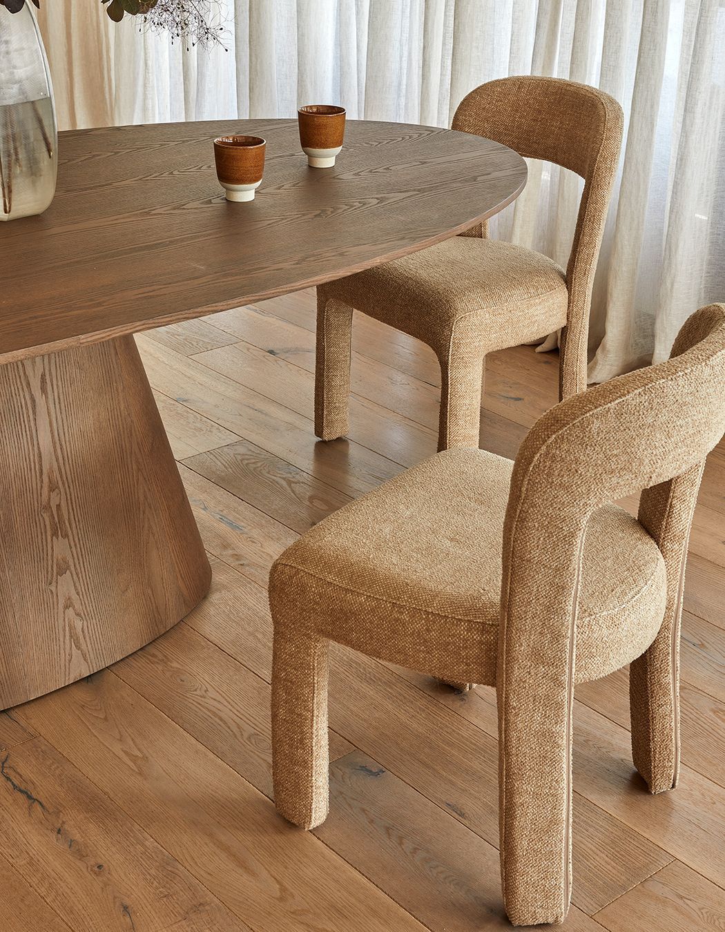 Pictured: Eleanor Dining Chair, Classique Oval Dining Table, Boden Ridge Vase