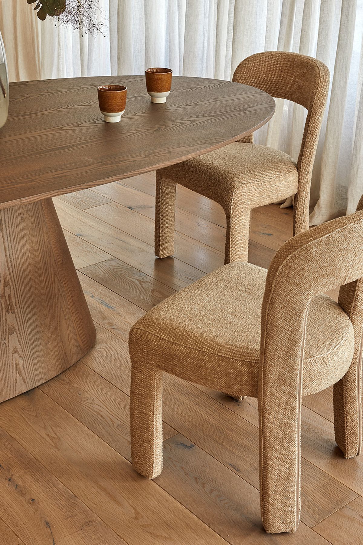 Pictured: Eleanor Dining Chair, Classique Oval Dining Table, Boden Ridge Vase