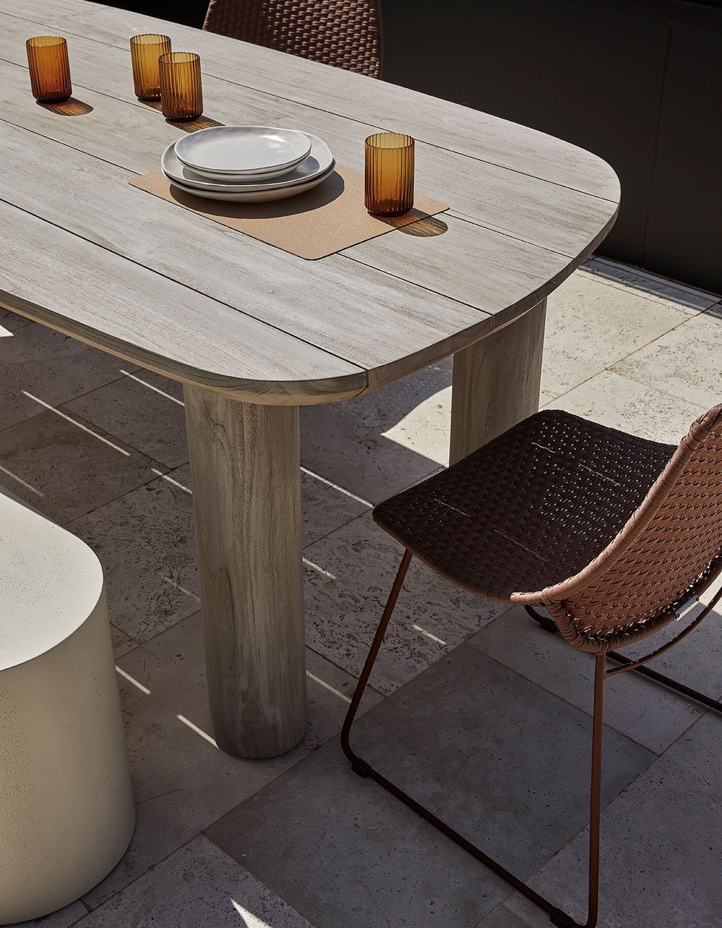 Pictured: Seb Outdoor Dining Table, Petra Bench, Corsica Scoop Dining Chair