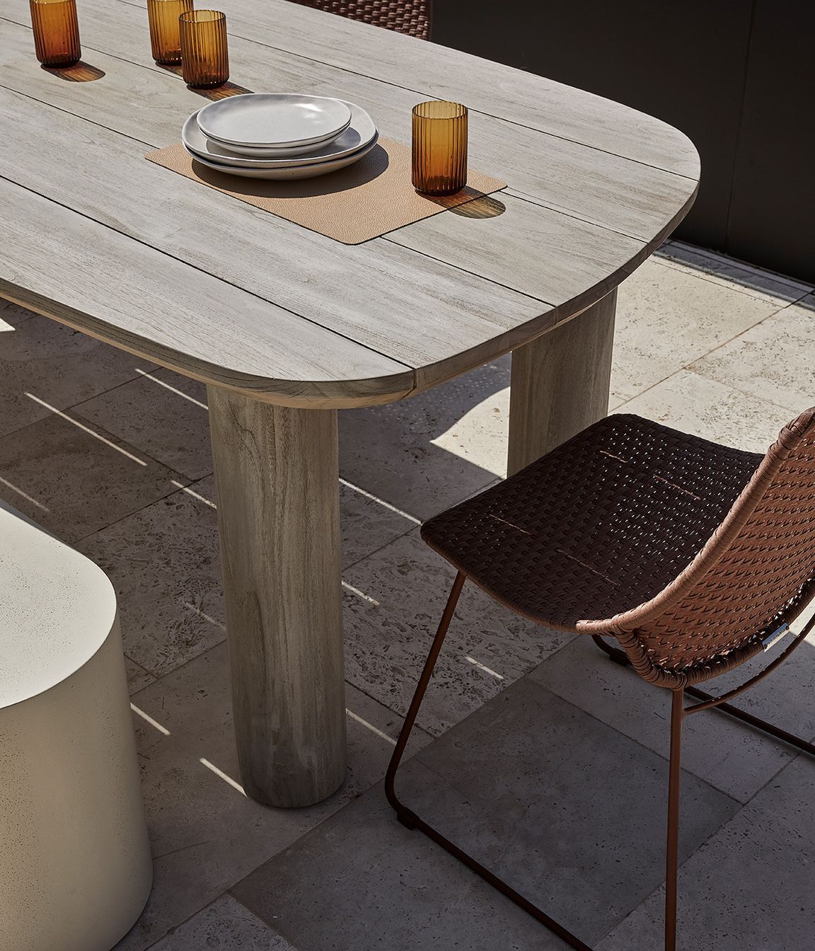 Pictured: Seb Outdoor Dining Table, Petra Bench, Corsica Scoop Dining Chair