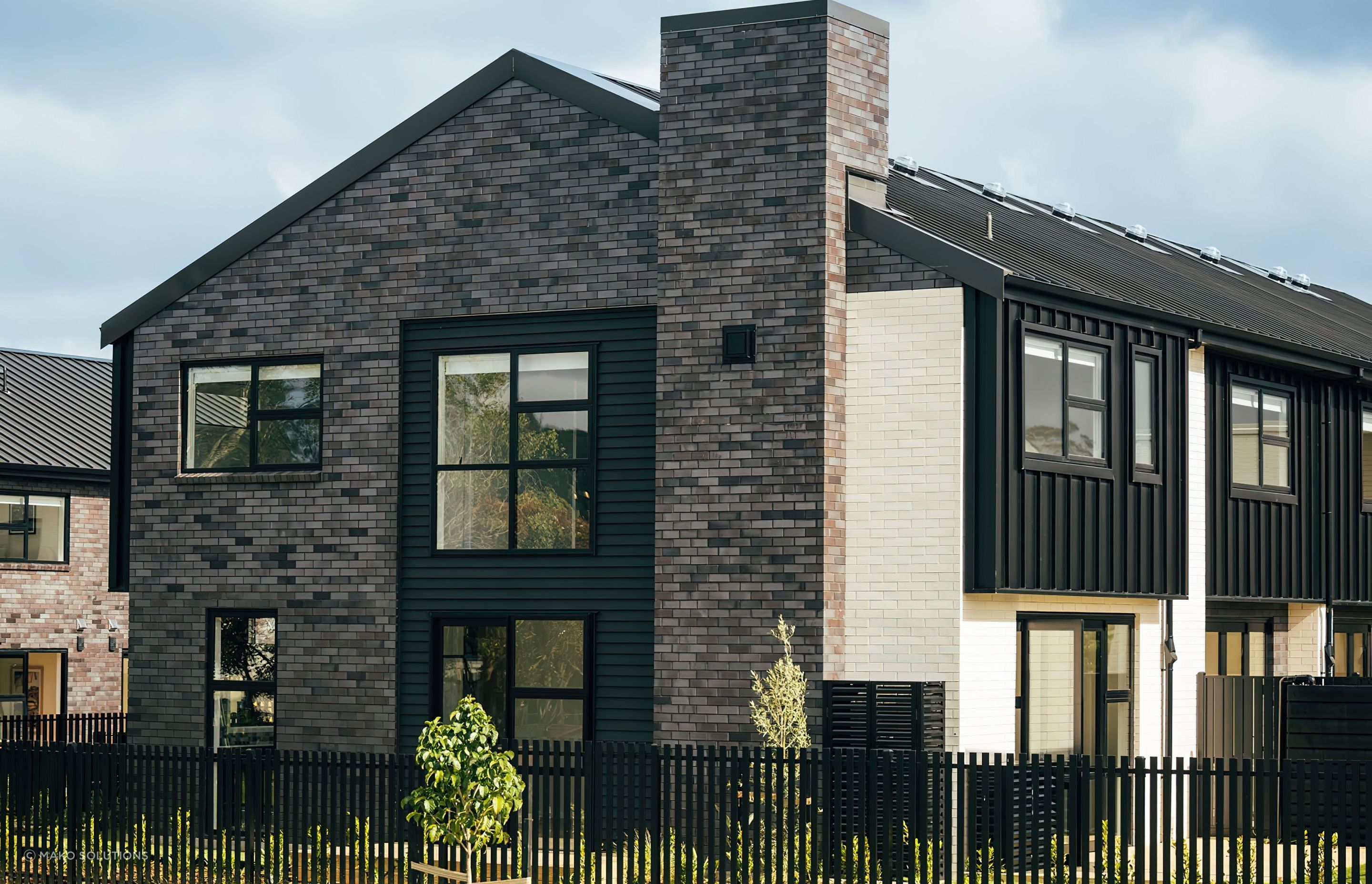 mako-solutions-townhouse-black-picket-fence-auckland-nz.jpeg