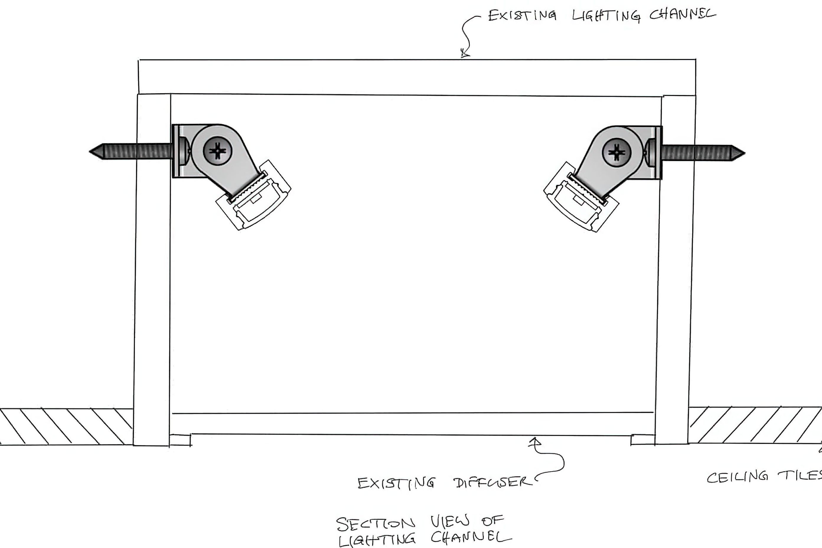 Our adjustable mounting brackets were fixed to the sides of the existing lighting channels. The adjustable brackets allowed the angle of the profile to be adjusted for best distribution of light across the diffuser. Colour control was provided by remote DALI modules.
