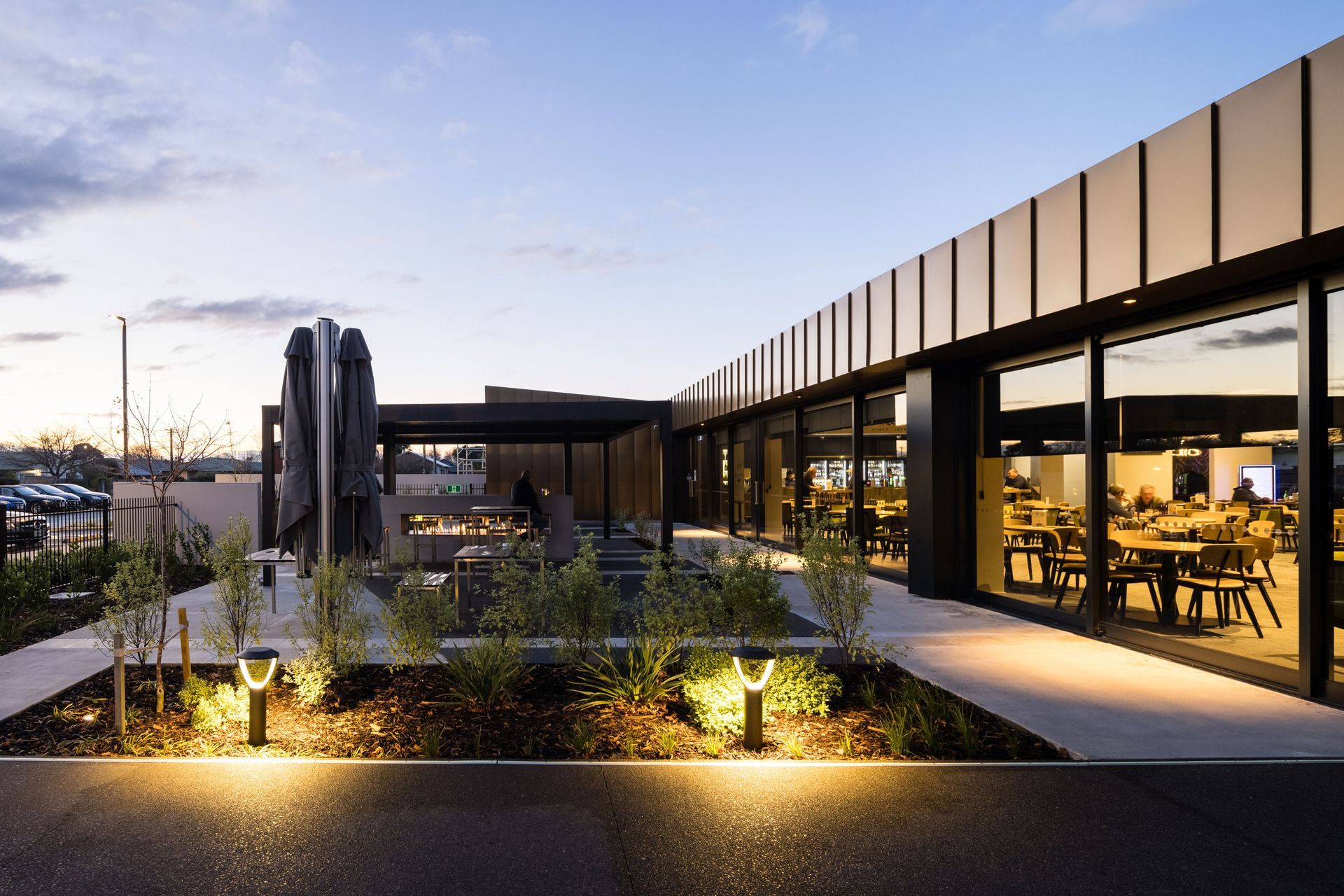 Located adjacent to The Tap Room, a large outdoor terrace provides a pleasant setting for outdoor dining and socialising. Photography by Clinton Lloyd.