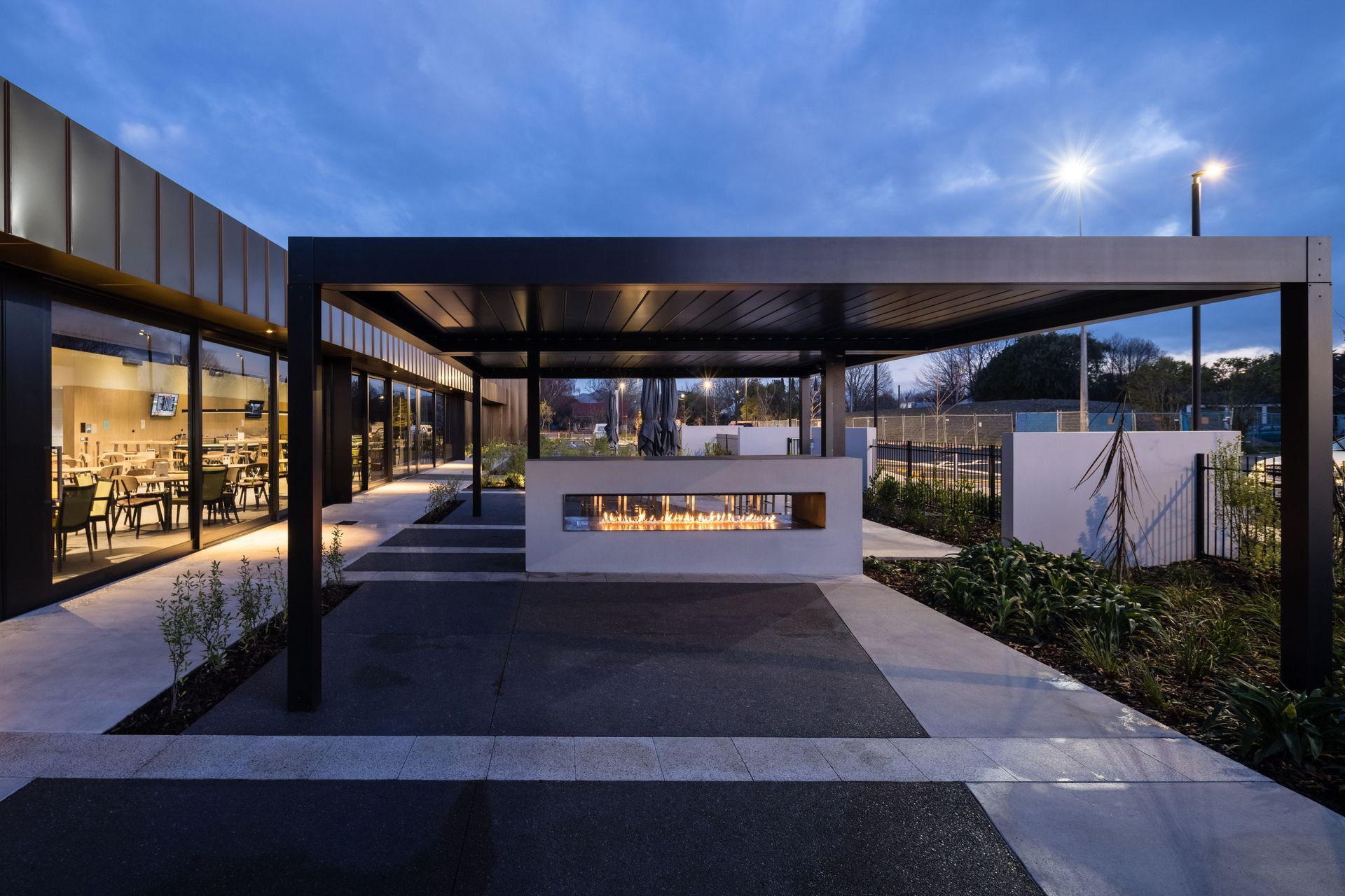 The terrace is large enough and equally functional to host a variety of gatherings in line with the club's brief for adaptable spaces. Photography by Clinton Lloyd.