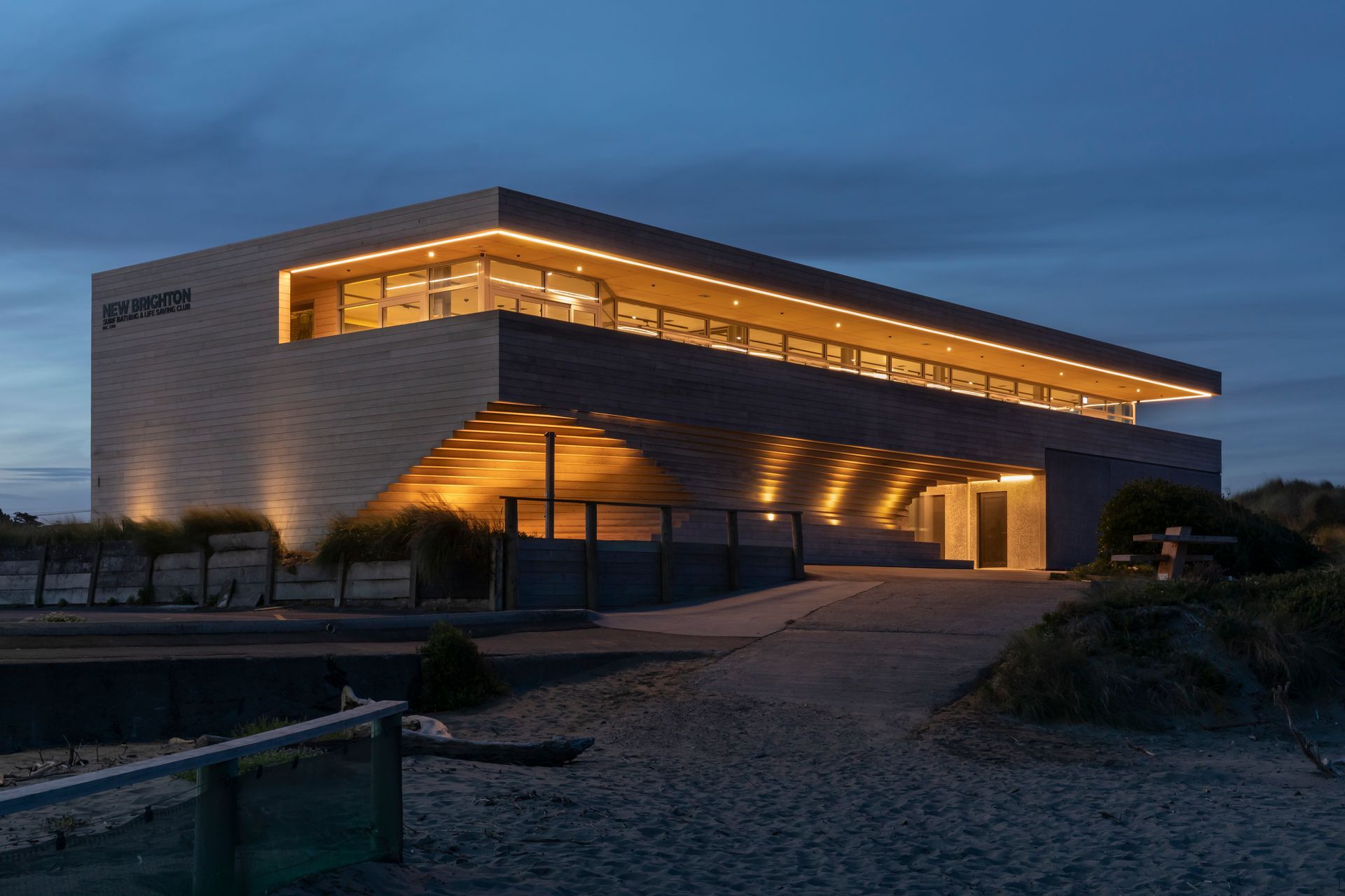 Up-lighting at night enhances the sculptural qualities of the building.
