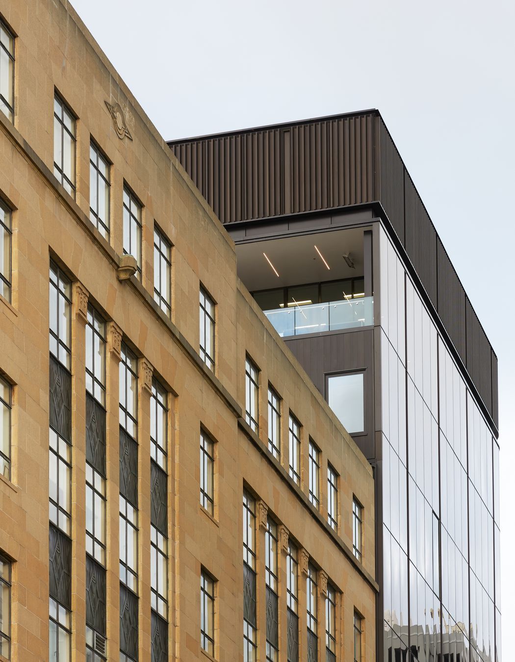 Finer detailing accentuates the building’s proportions. “There’s a 'cap' at the top of the building that’s a series of vertical fins. It was something our client quite liked and is very traditional on an office building,” says Marc.
