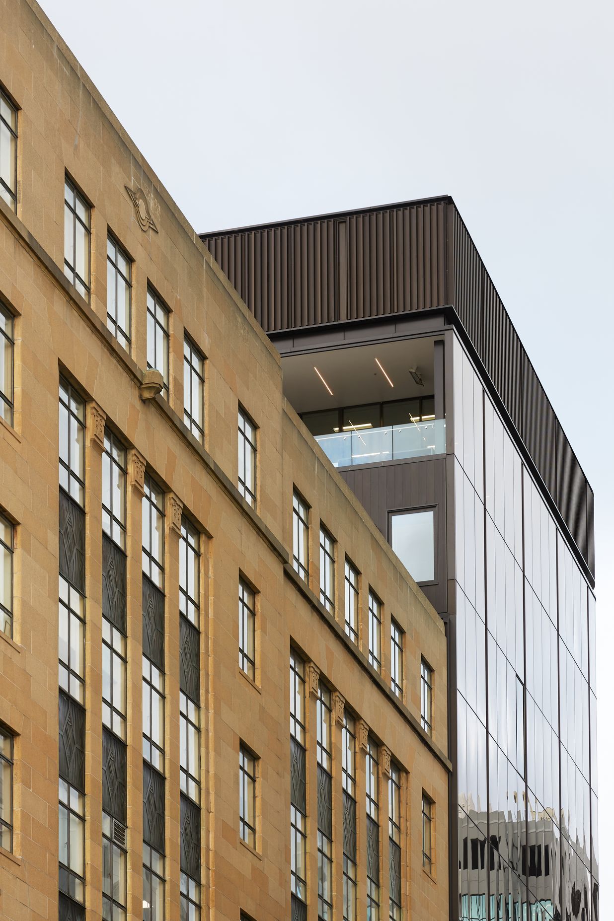 Finer detailing accentuates the building’s proportions. “There’s a 'cap' at the top of the building that’s a series of vertical fins. It was something our client quite liked and is very traditional on an office building,” says Marc.
