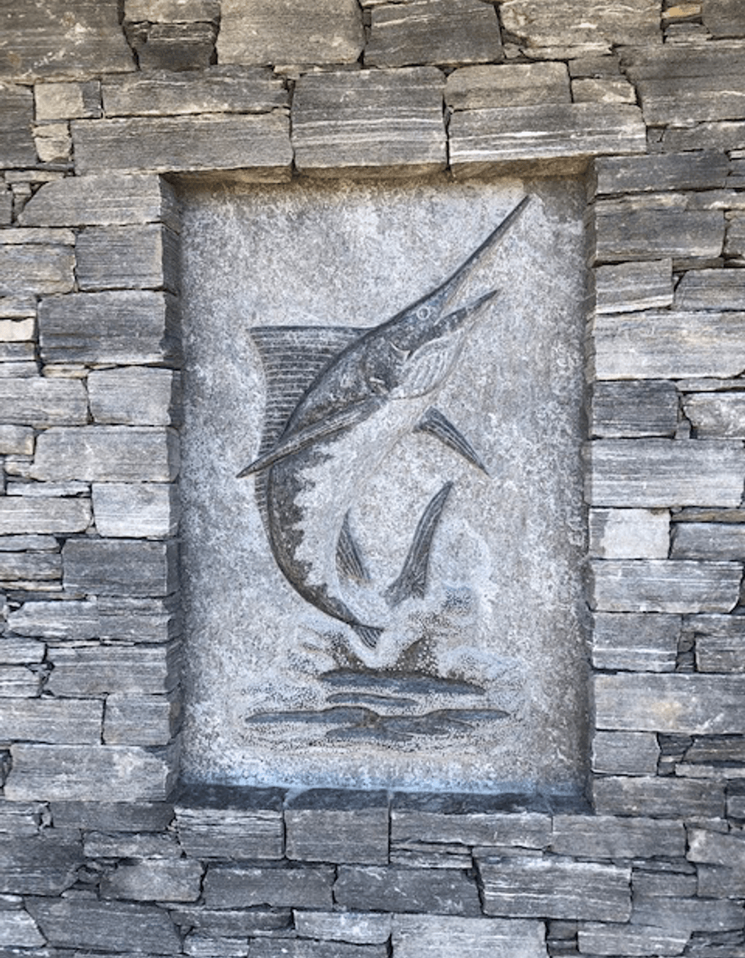 Carved marlin by A World Of Stone Ltd in West Coast Schist