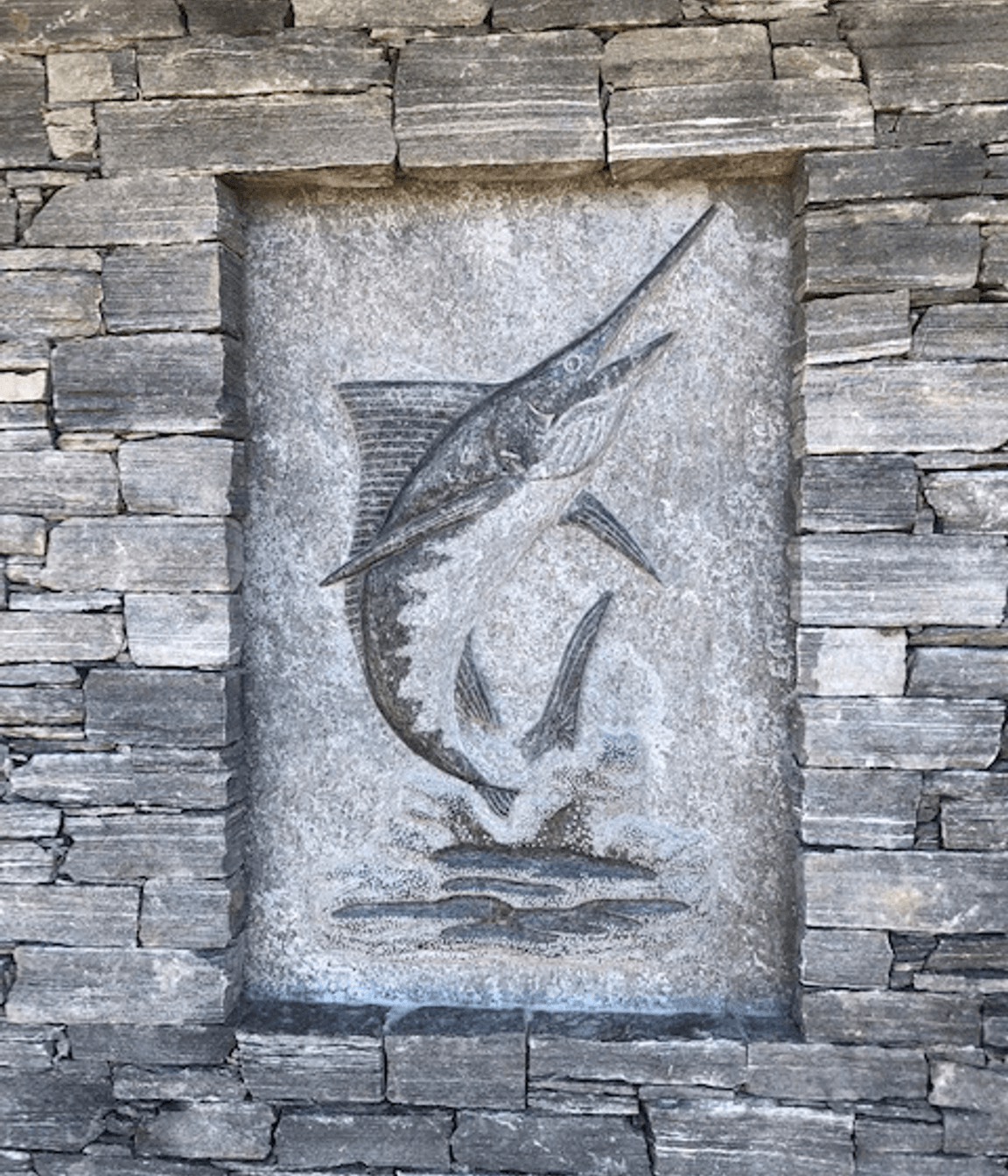 Carved marlin by A World Of Stone Ltd in West Coast Schist