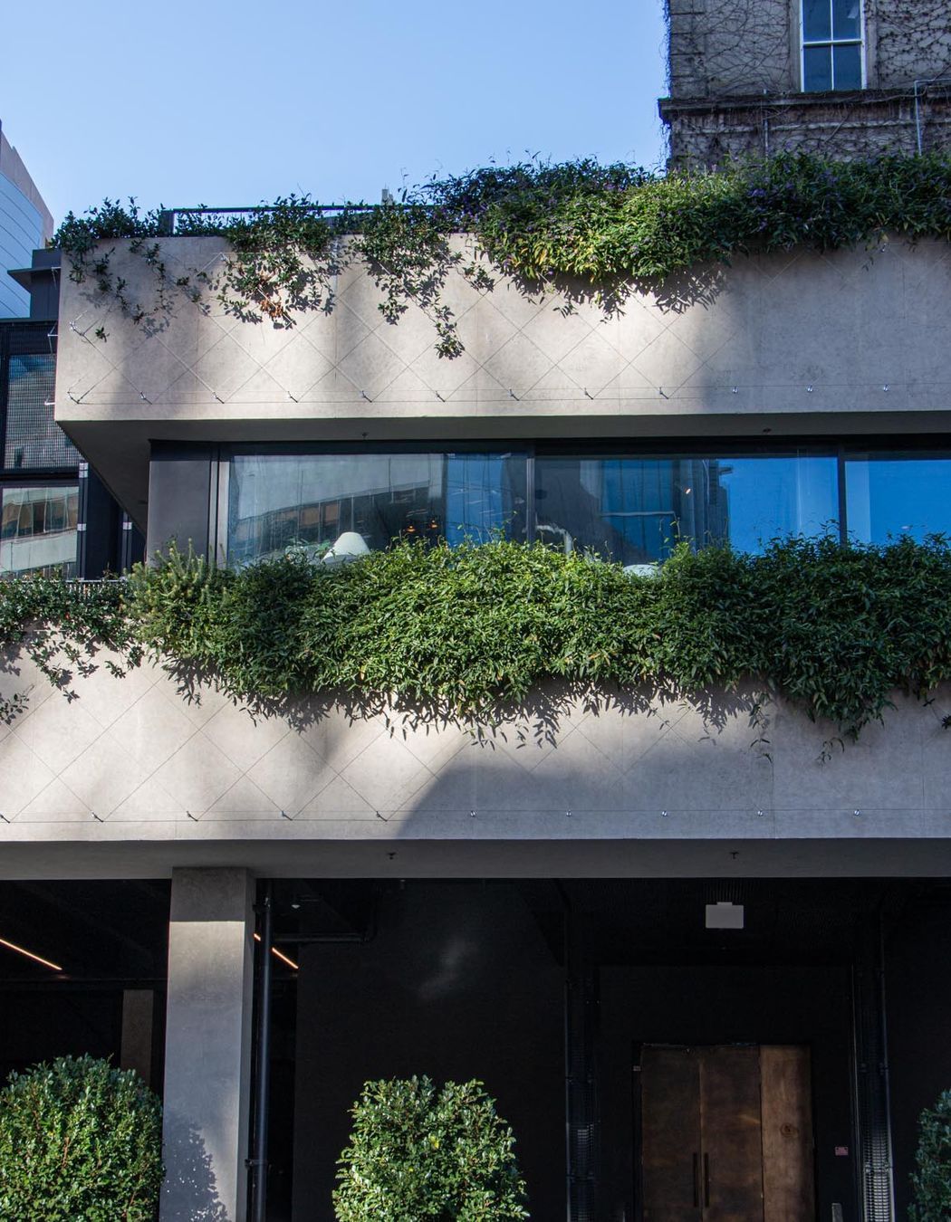 Northern Club Bankside Extension - balustrade and green facade project