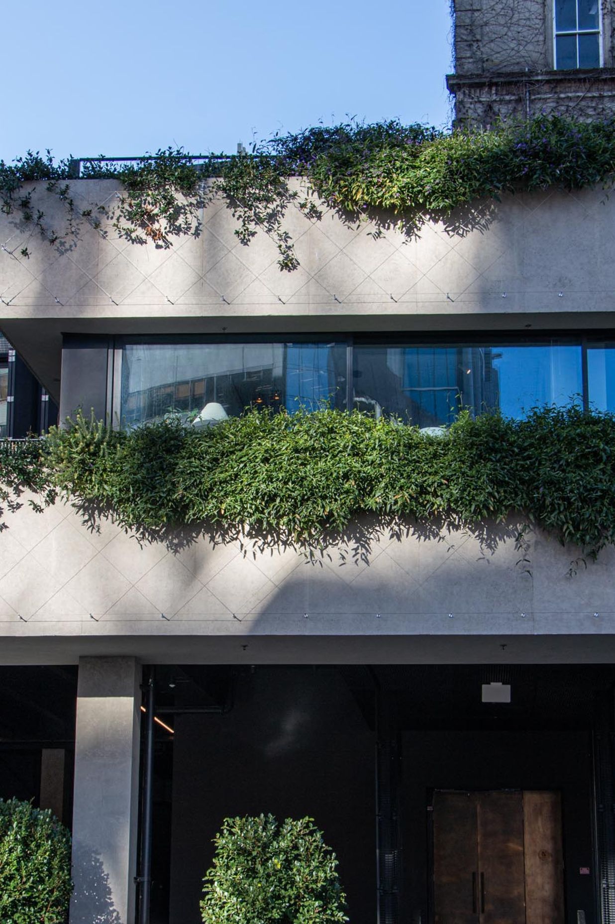 Northern Club Bankside Extension - balustrade and green facade project