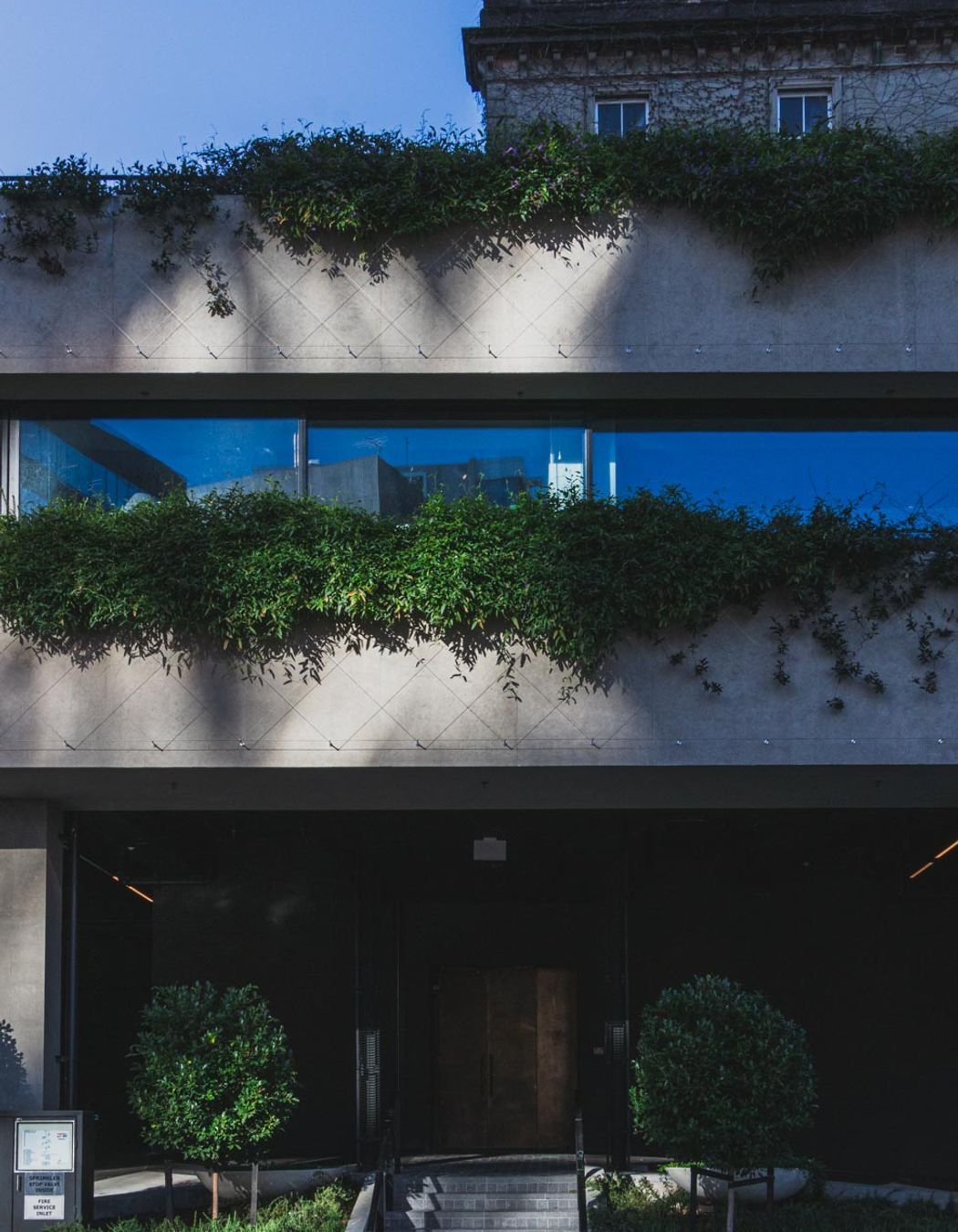 Northern Club Bankside Extension - balustrade and green facade project