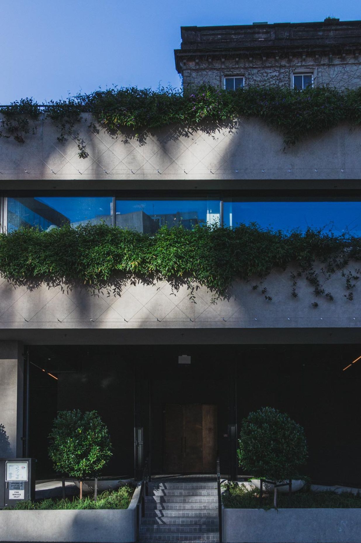 Northern Club Bankside Extension - balustrade and green facade project