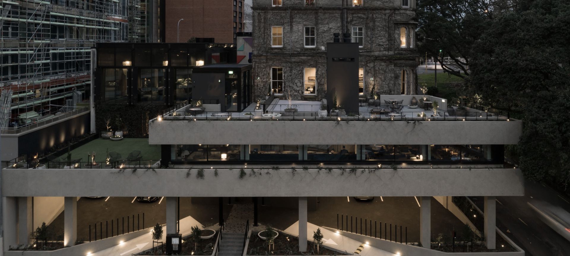 Northern Club Bankside Extension - balustrade, bollard and green facade  banner