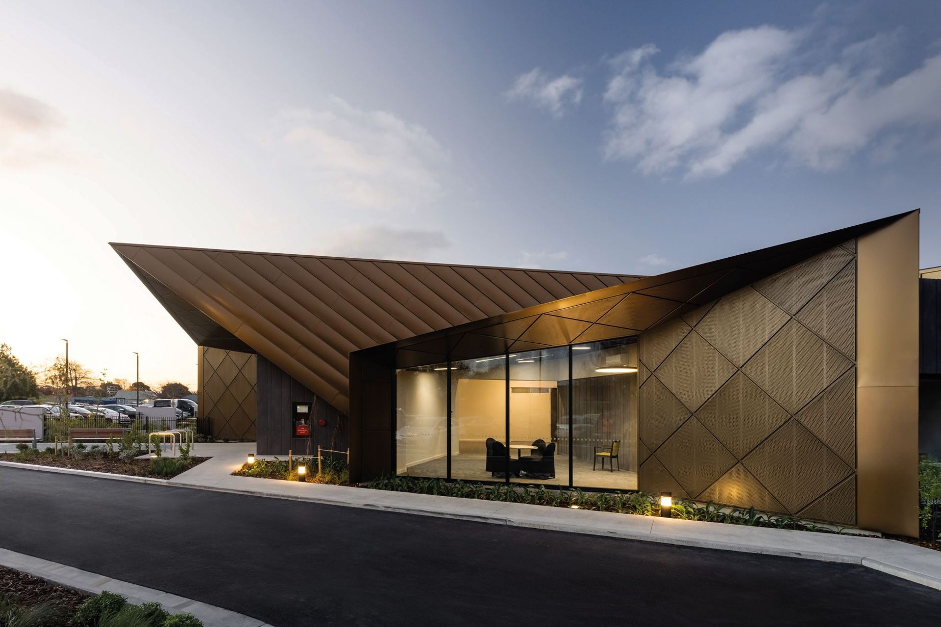 The design of the building was conceived in such a way as to frame different aspects in a sculptural sense to give the building a real sense of presence. Photography by Clinton Lloyd.