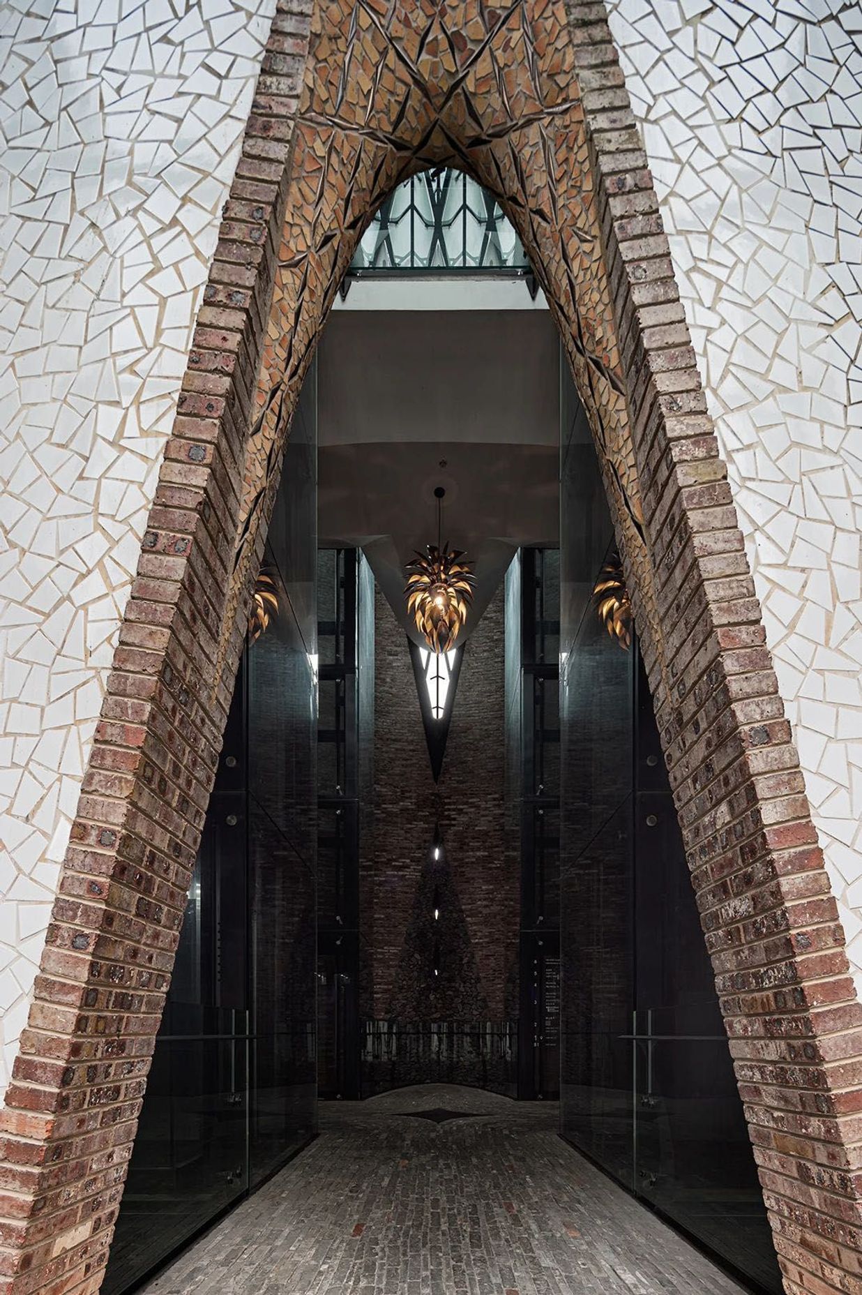 A custom-made Lotus Chandelier hanging in the entrance of the Tower lift shaft.