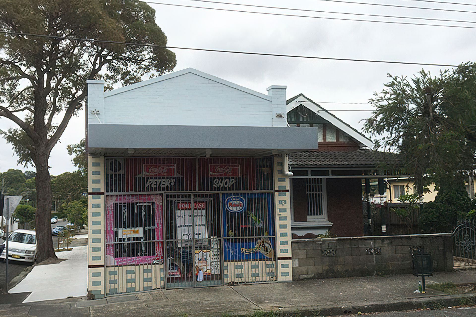 Original shopfront had an inaccessible step, and rotten flooring. It had ceased to be a viable business enterprise due to the unhealthy condition of the building.