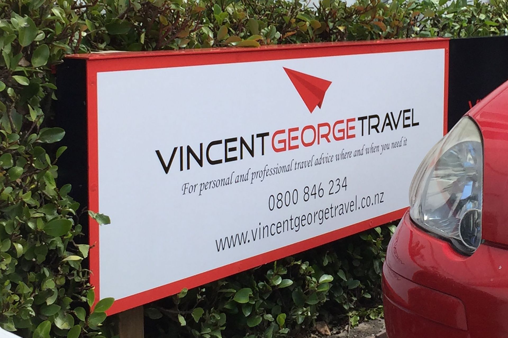 Office signage for Vincent George Travel, Dunedin