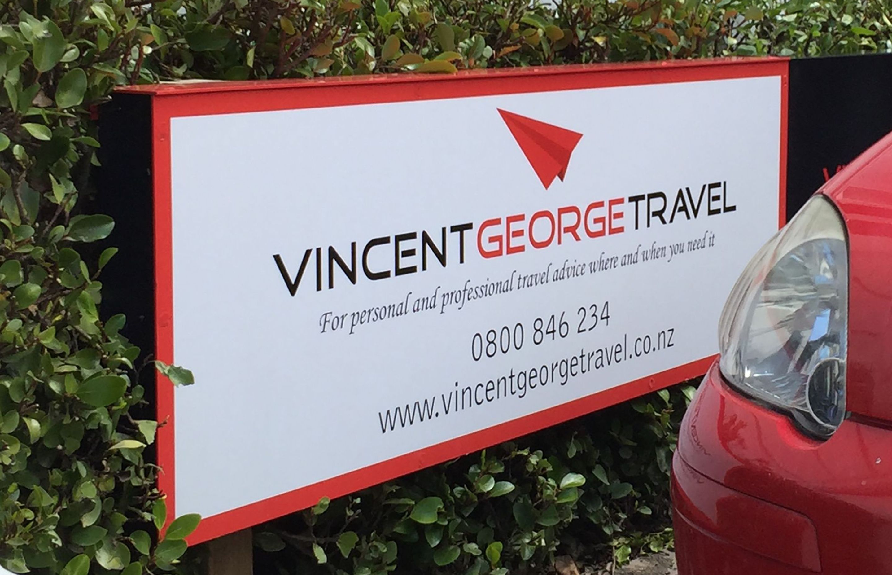 Office signage for Vincent George Travel, Dunedin