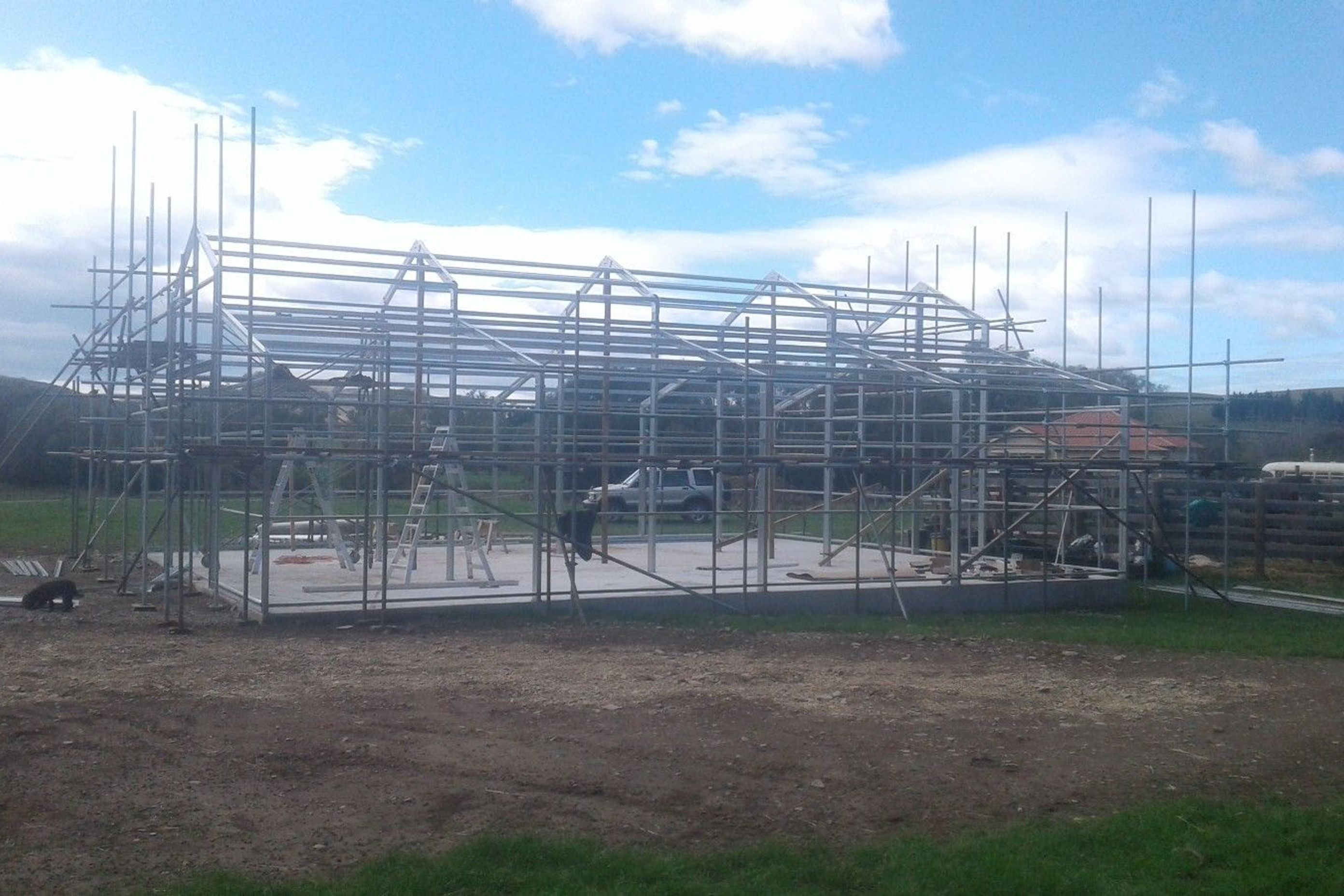 Scaffolding being erected higher, steel framing making progress cont-