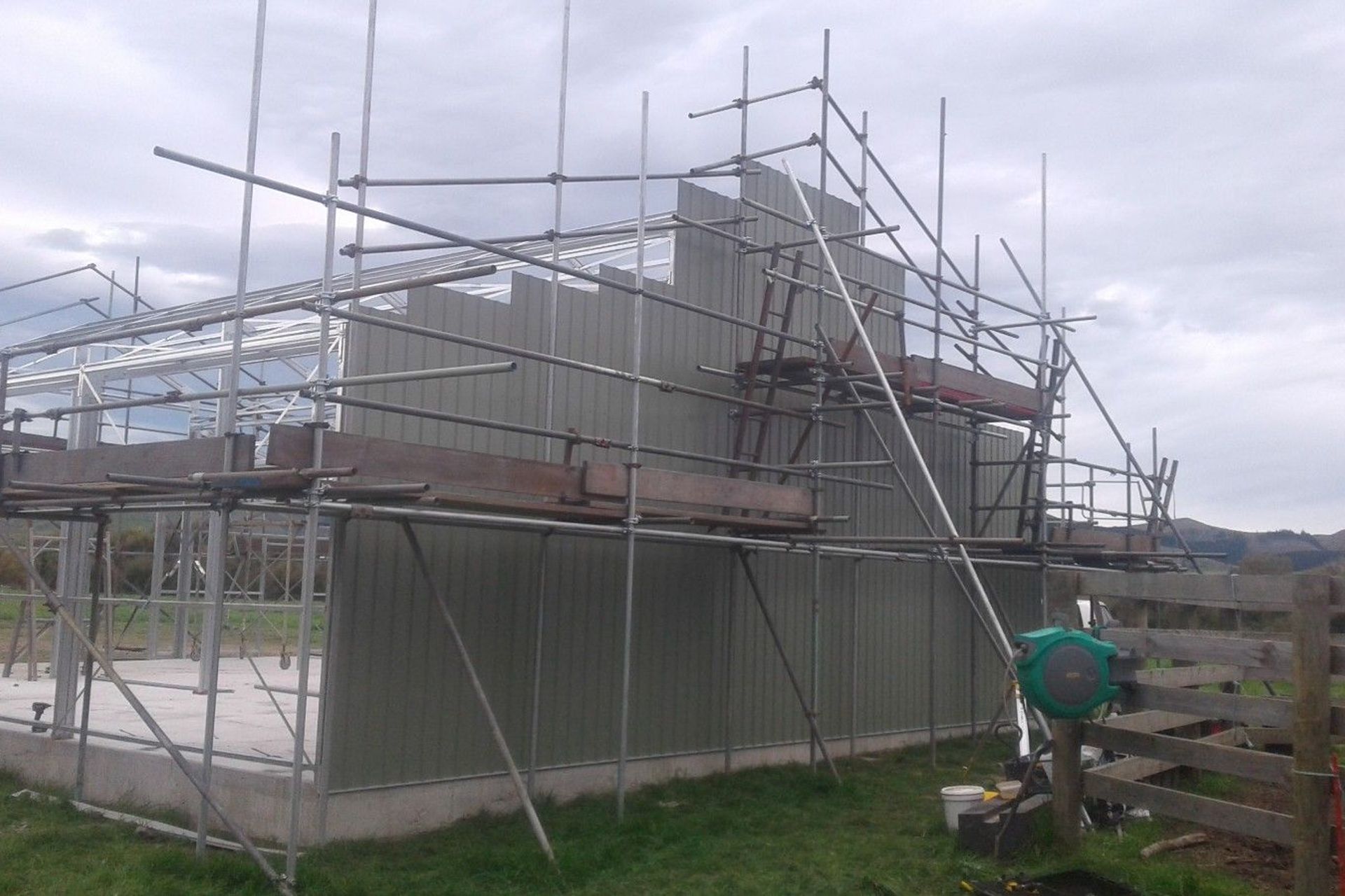 Cladding starting to be affixed to the building