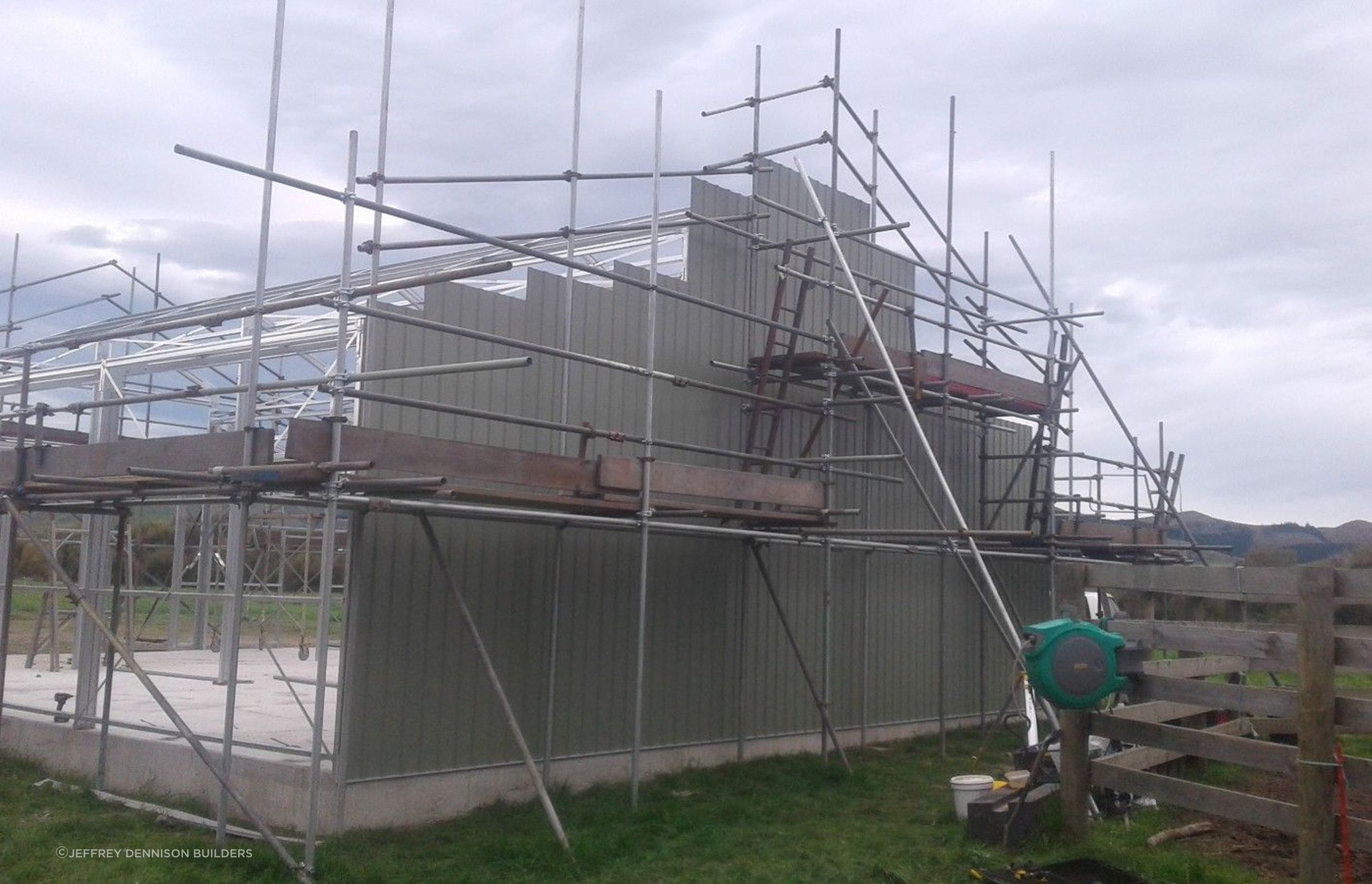 Cladding starting to be affixed to the building