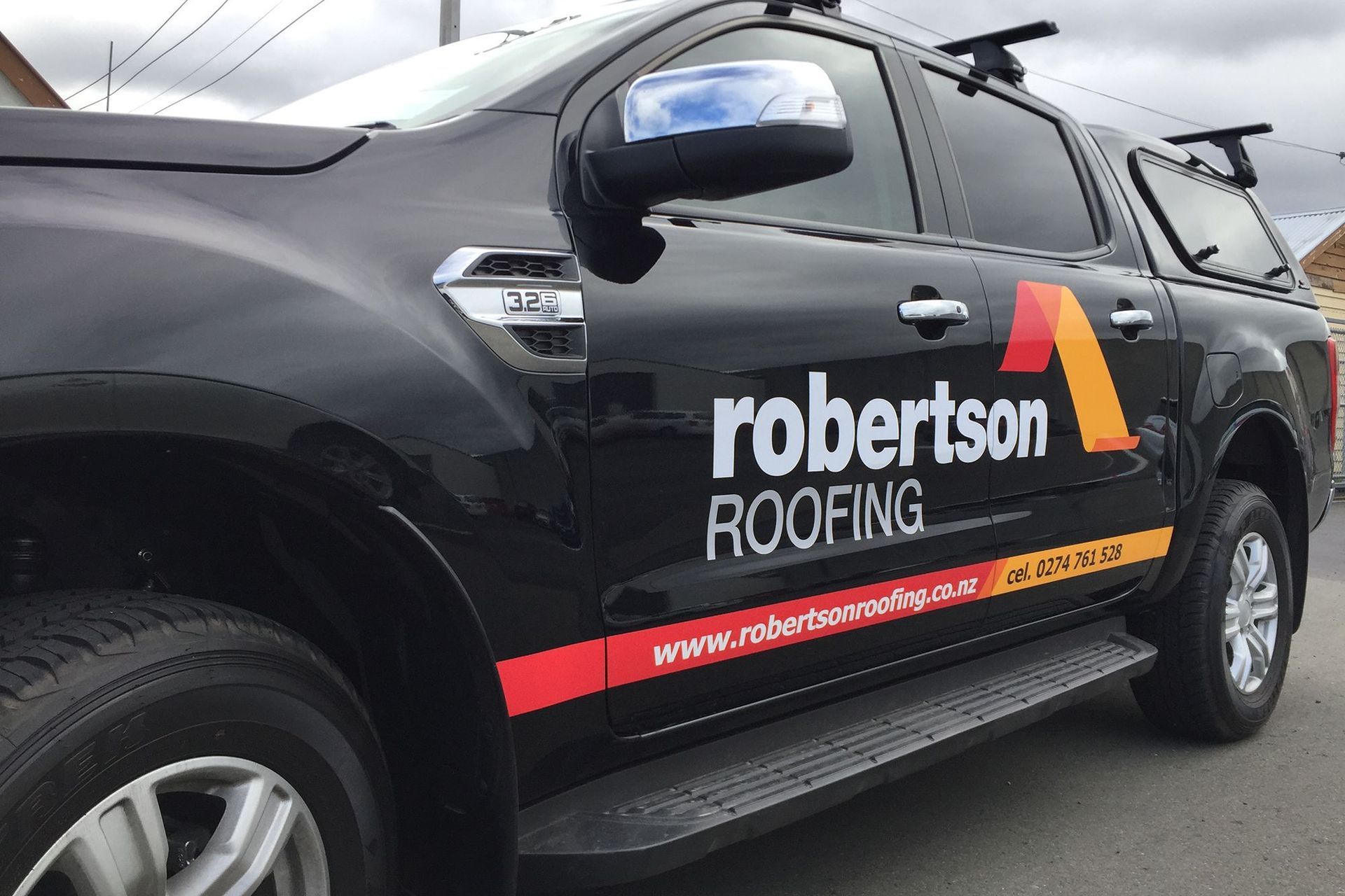 Vehicle signage Robertson Roofing, Dunedin
