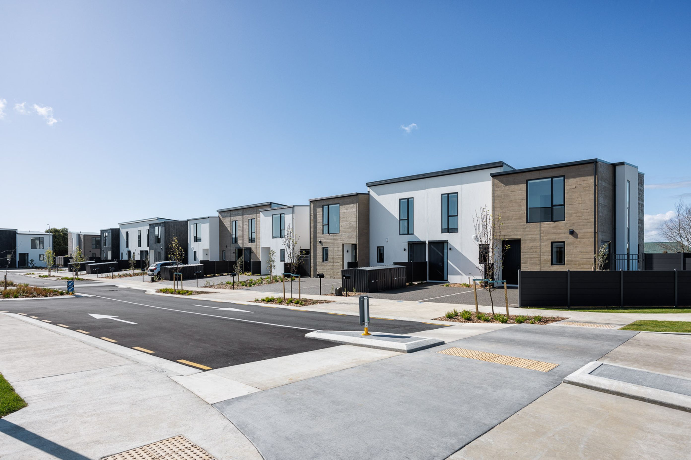 Textures and contrast with precast concrete panels for new housing development.