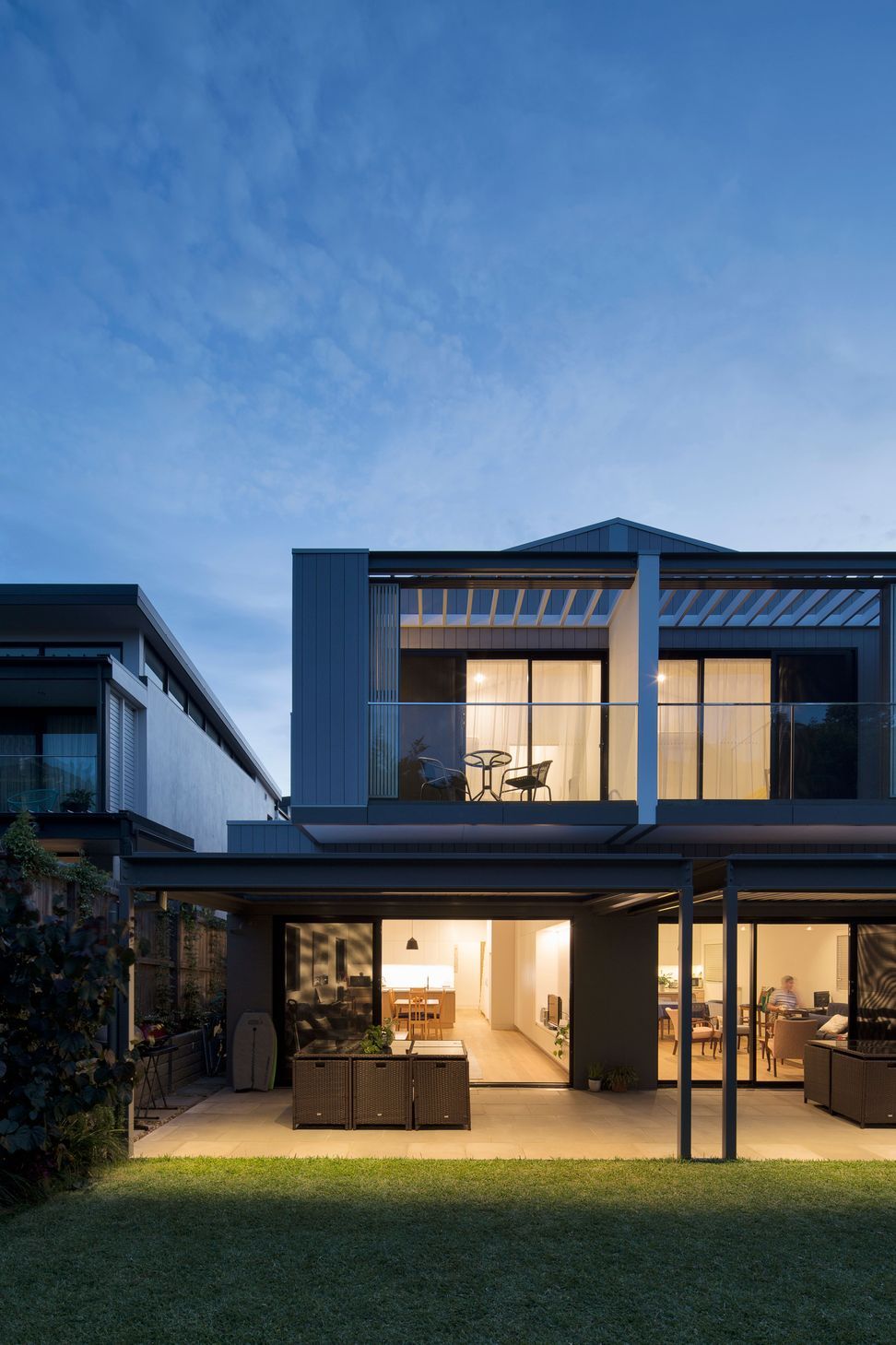 View of the two homes from the shared backyard