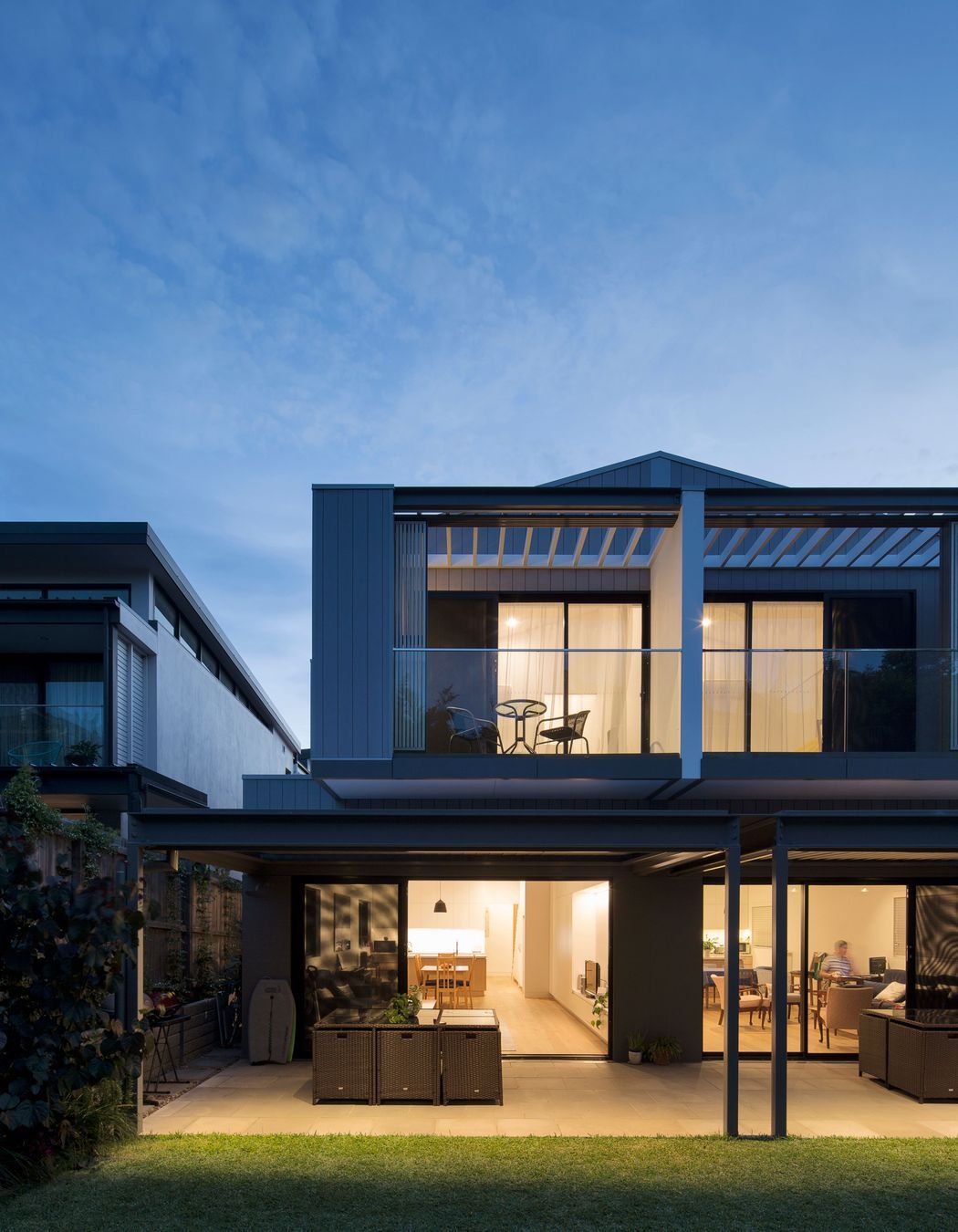View of the two homes from the shared backyard