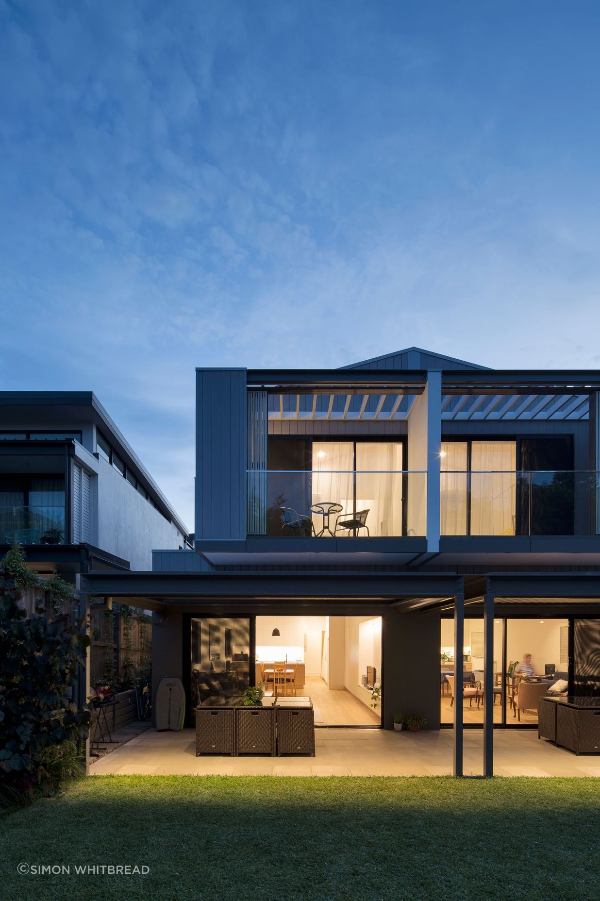 View of the two homes from the shared backyard
