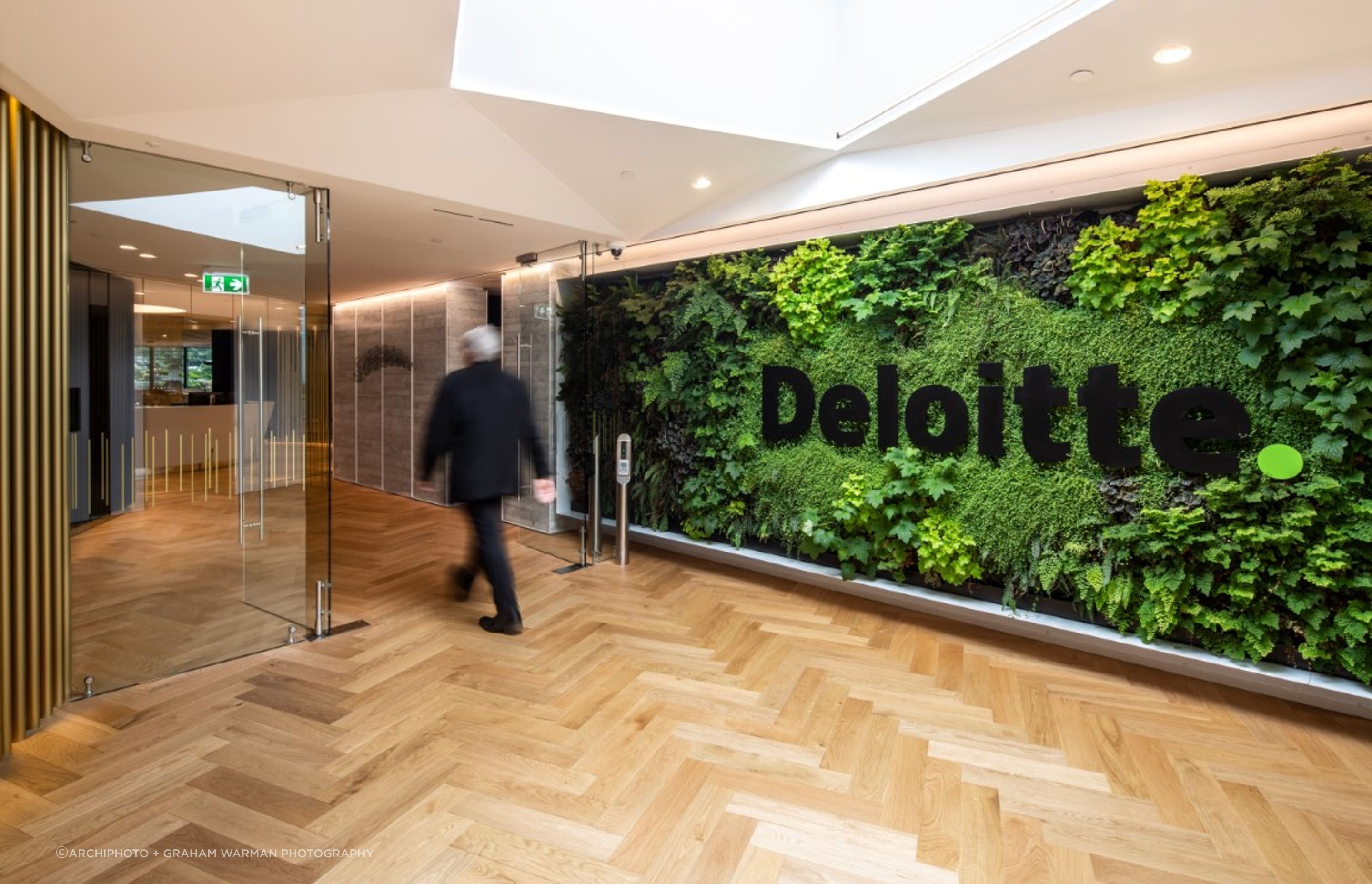 Lift lobby and green logo wall