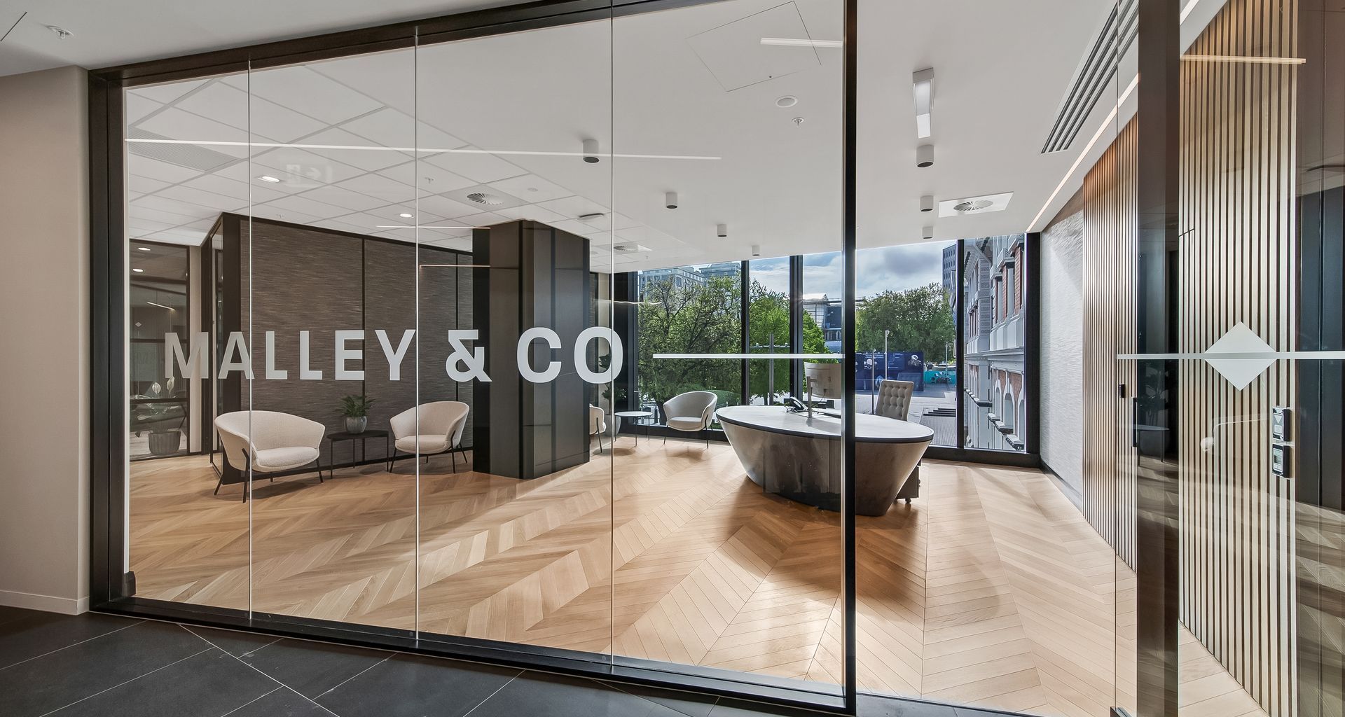 Malley & Co Lawyers banner