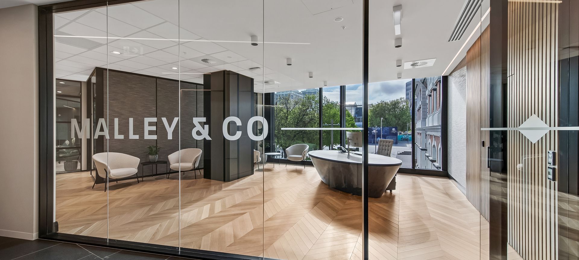 Malley & Co Lawyers banner
