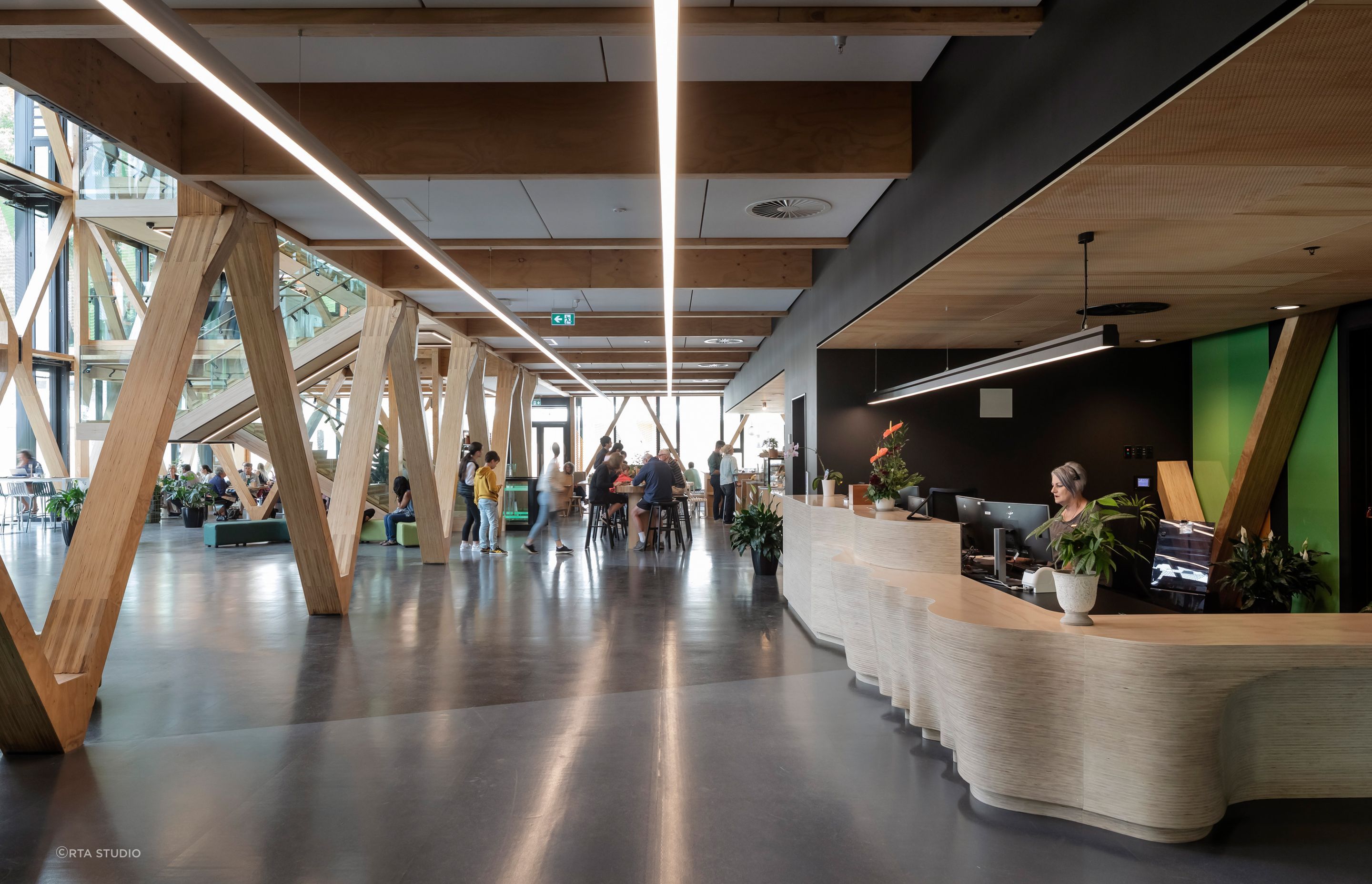 The reception desk is made from layers of ply that have been CNC cut and then assembled into a solid whole.