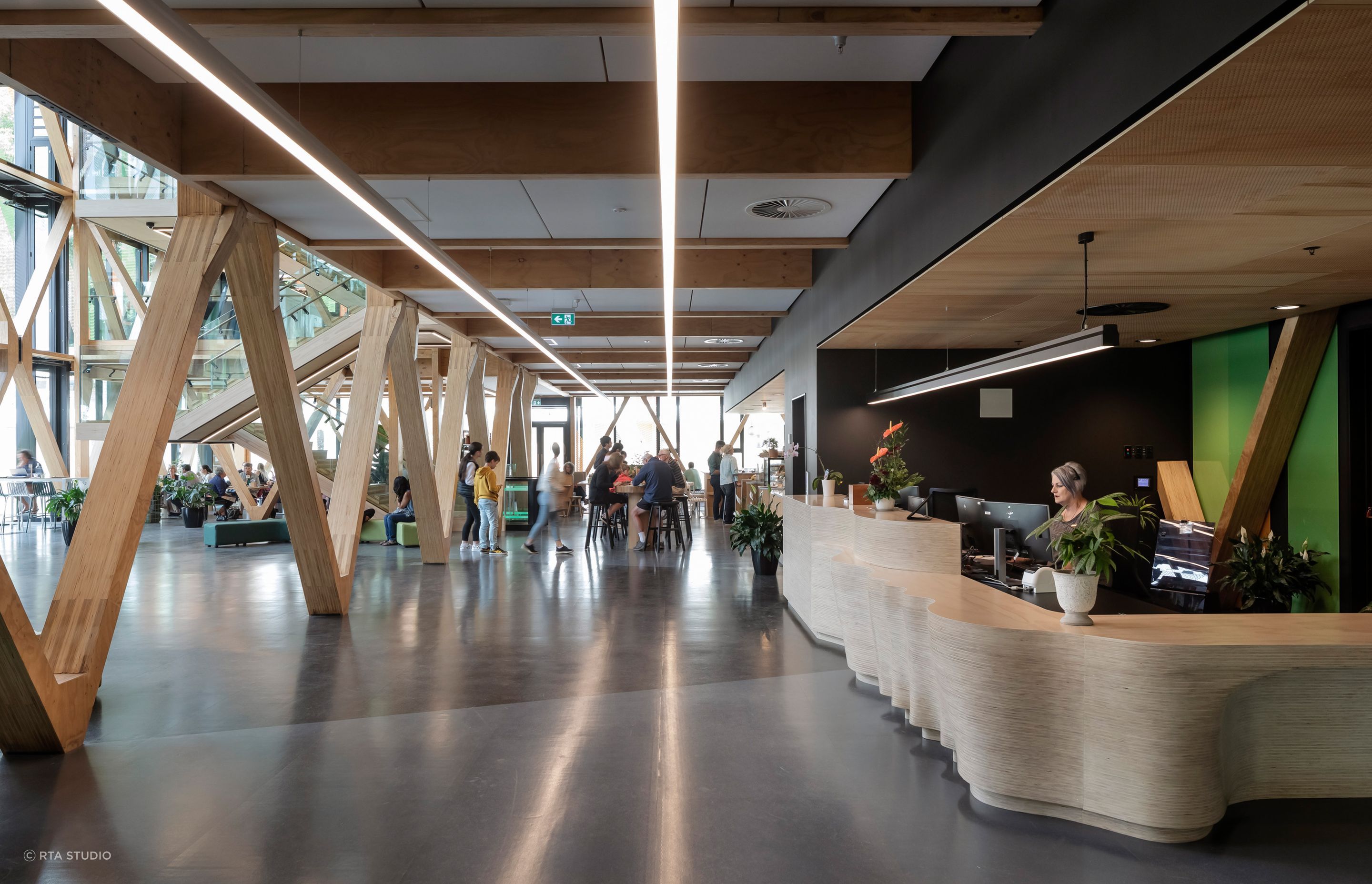 The reception desk is made from layers of ply that have been CNC cut and then assembled into a solid whole.