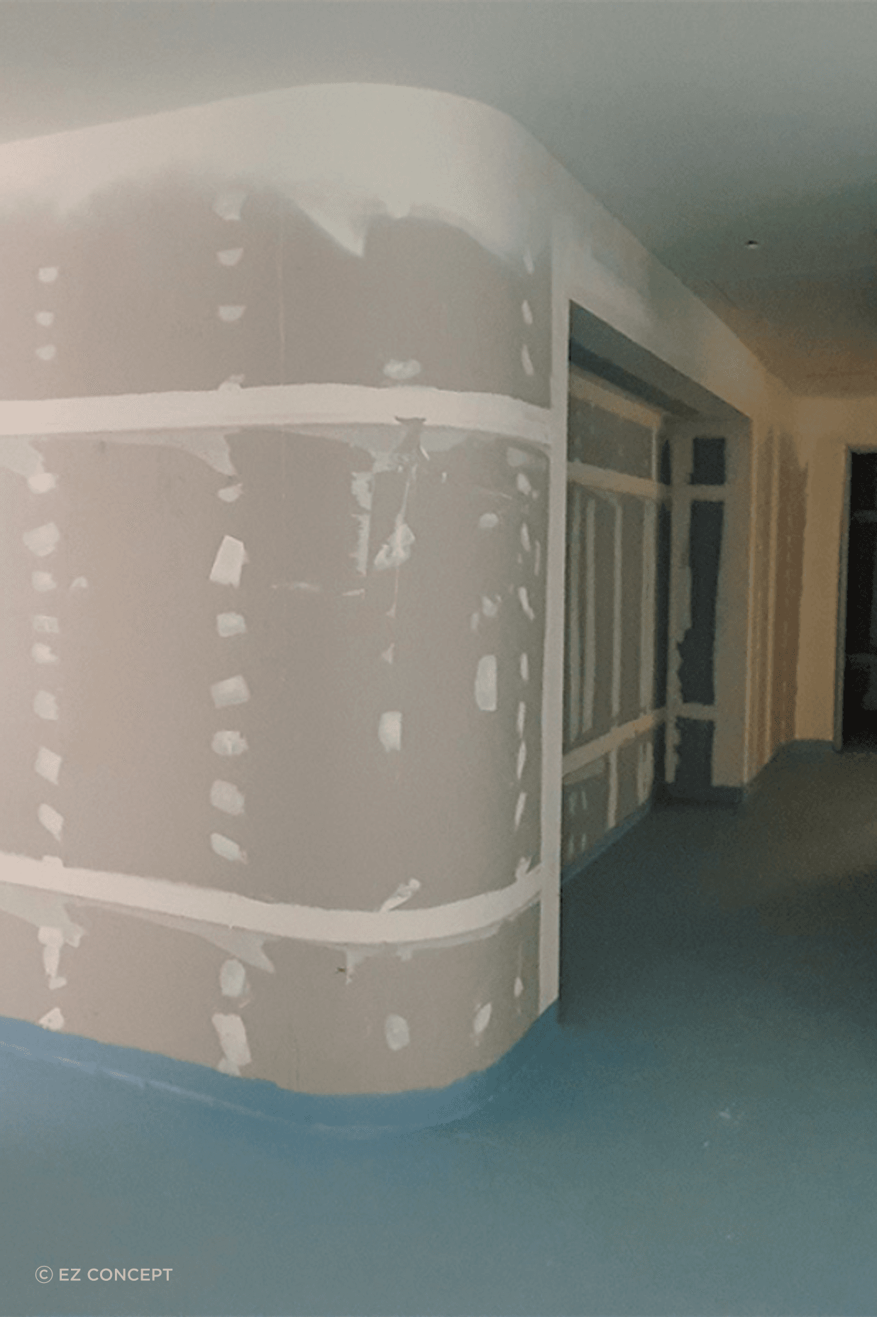 Studco EzyTrack used to create curved walls which include storage spaces. The finished curved walls provide function and aesthetic, adding to the flowing curves of Wesley Place.